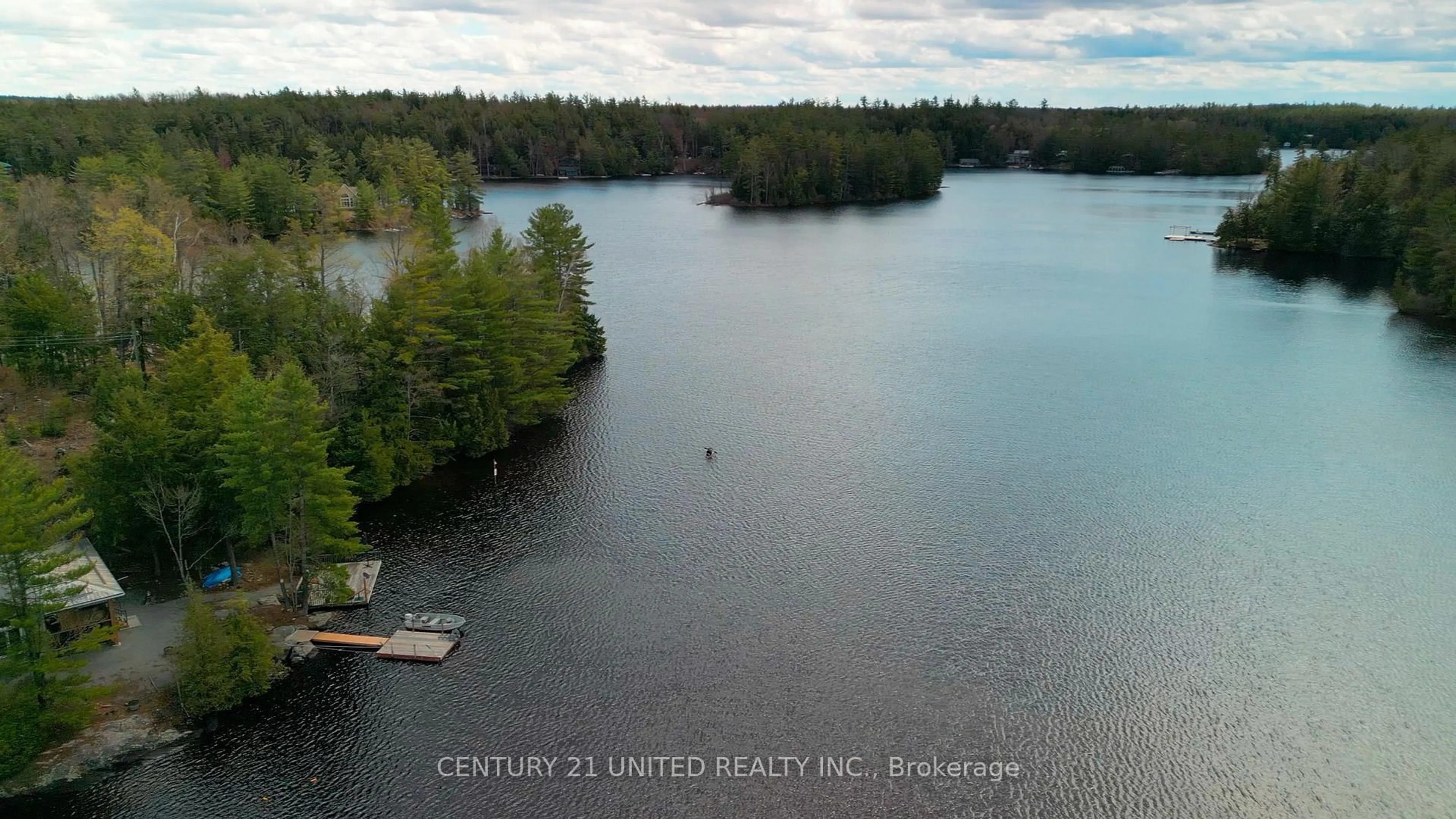 A pic from outside/outdoor area/front of a property/back of a property/a pic from drone, water/lake/river/ocean view for 44 Fire Route 223, Trent Lakes Ontario K0L 1J0