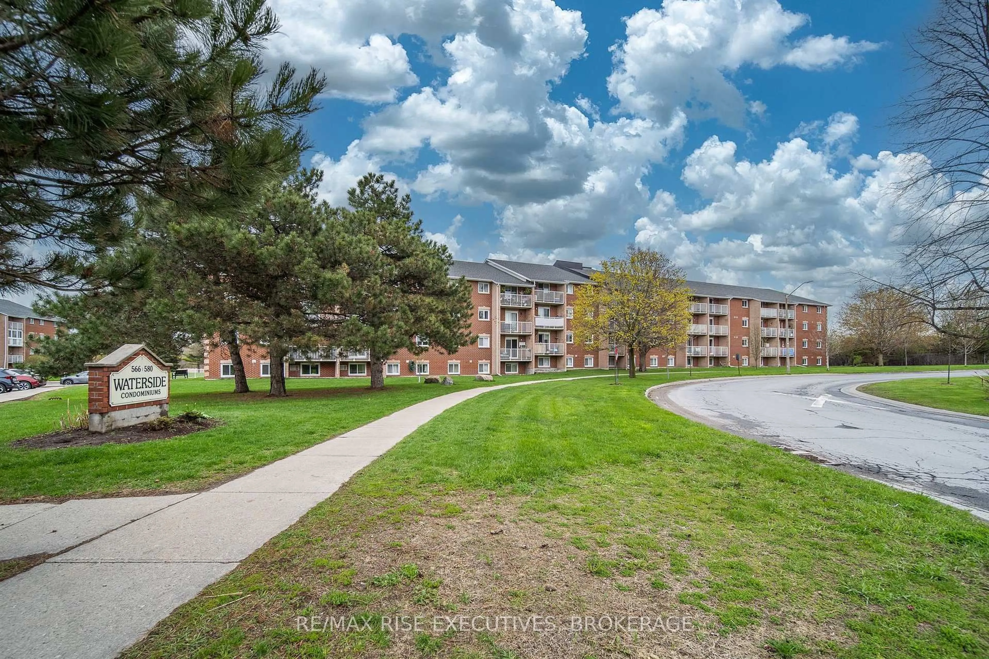 A pic from outside/outdoor area/front of a property/back of a property/a pic from drone, unknown for 566 Armstrong Rd #214, Kingston Ontario K7M 8M2