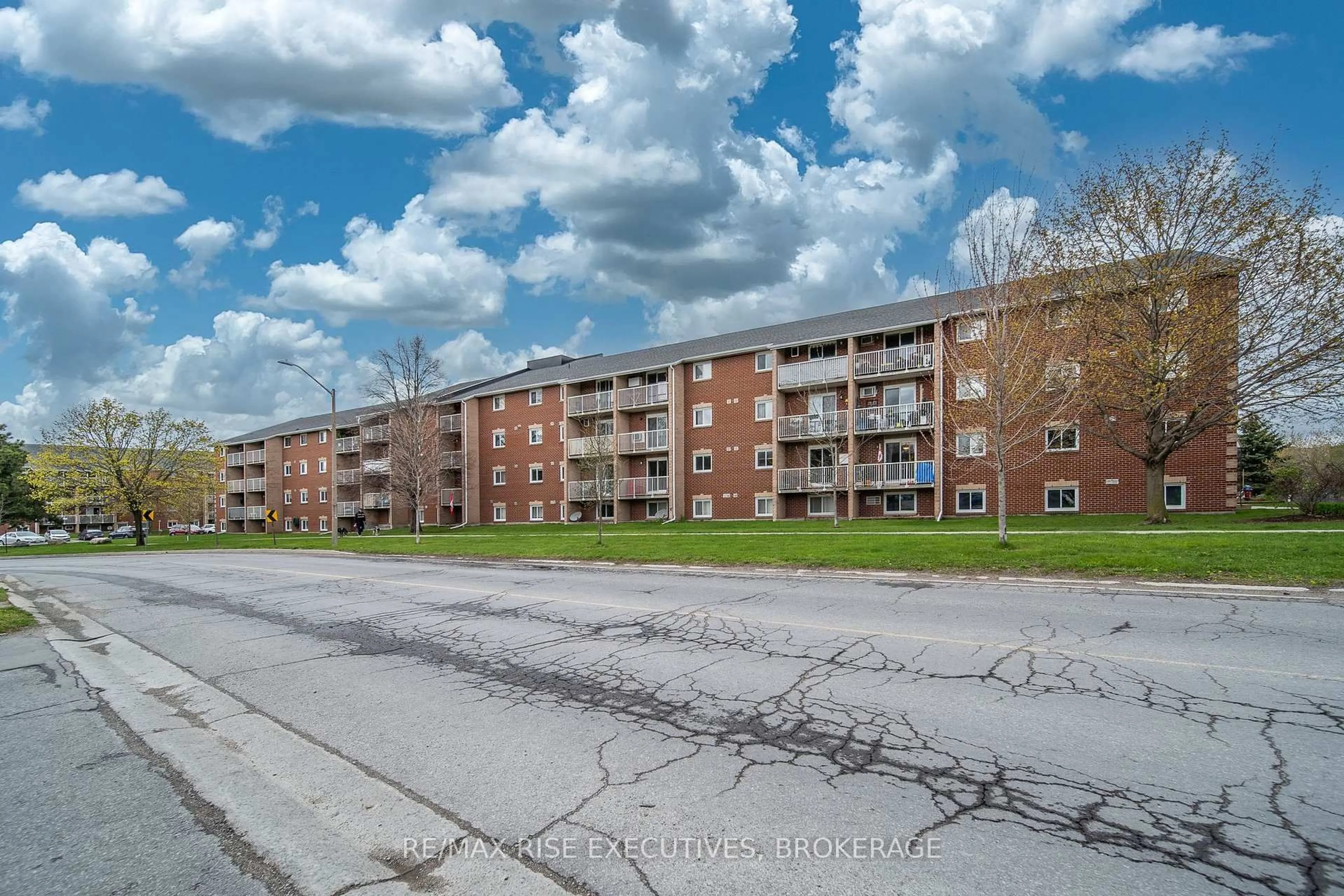 A pic from outside/outdoor area/front of a property/back of a property/a pic from drone, street for 566 Armstrong Rd #214, Kingston Ontario K7M 8M2