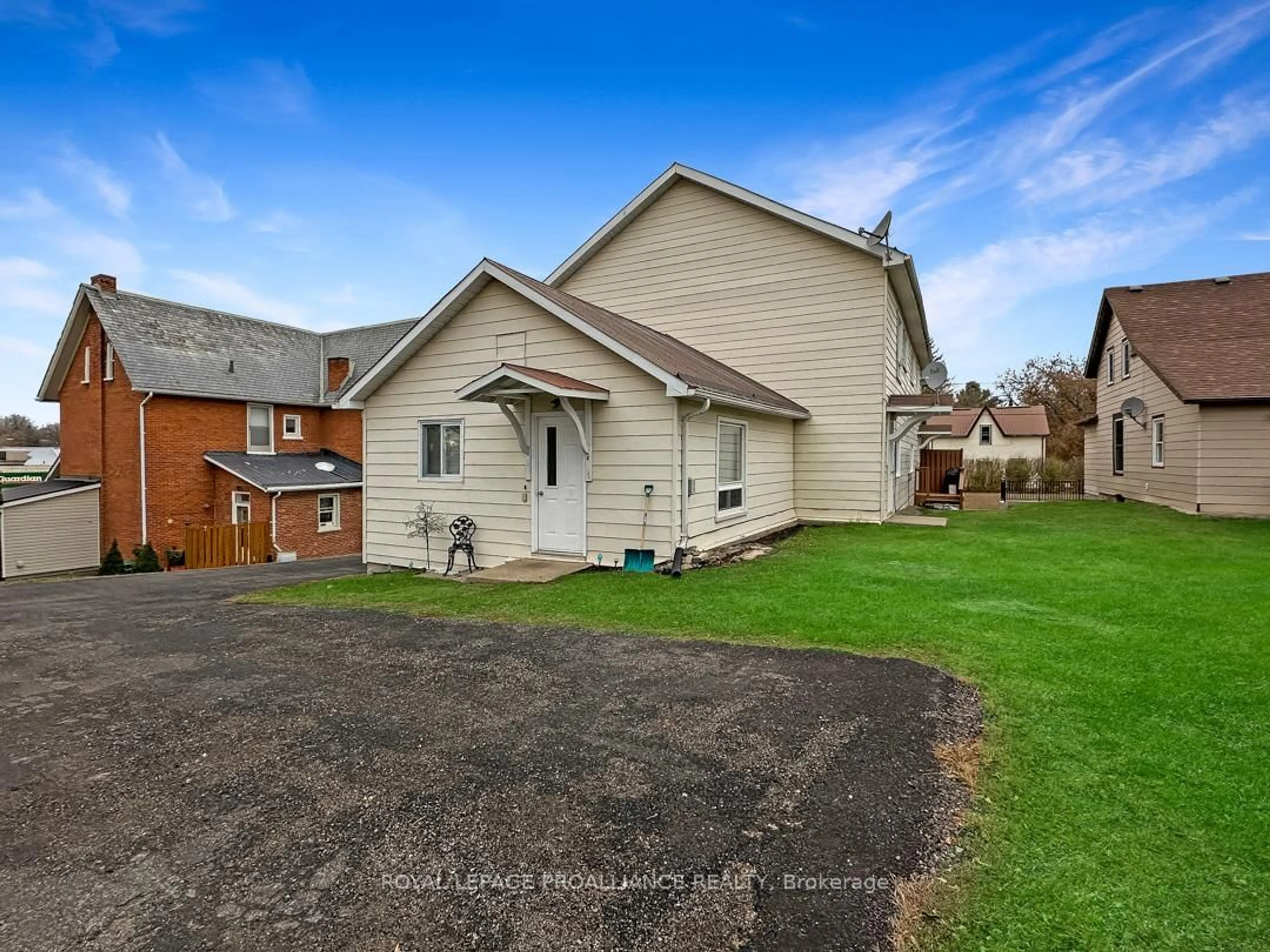 A pic from outside/outdoor area/front of a property/back of a property/a pic from drone, street for 91 St. Lawrence St, Madoc Ontario K0K 2K0