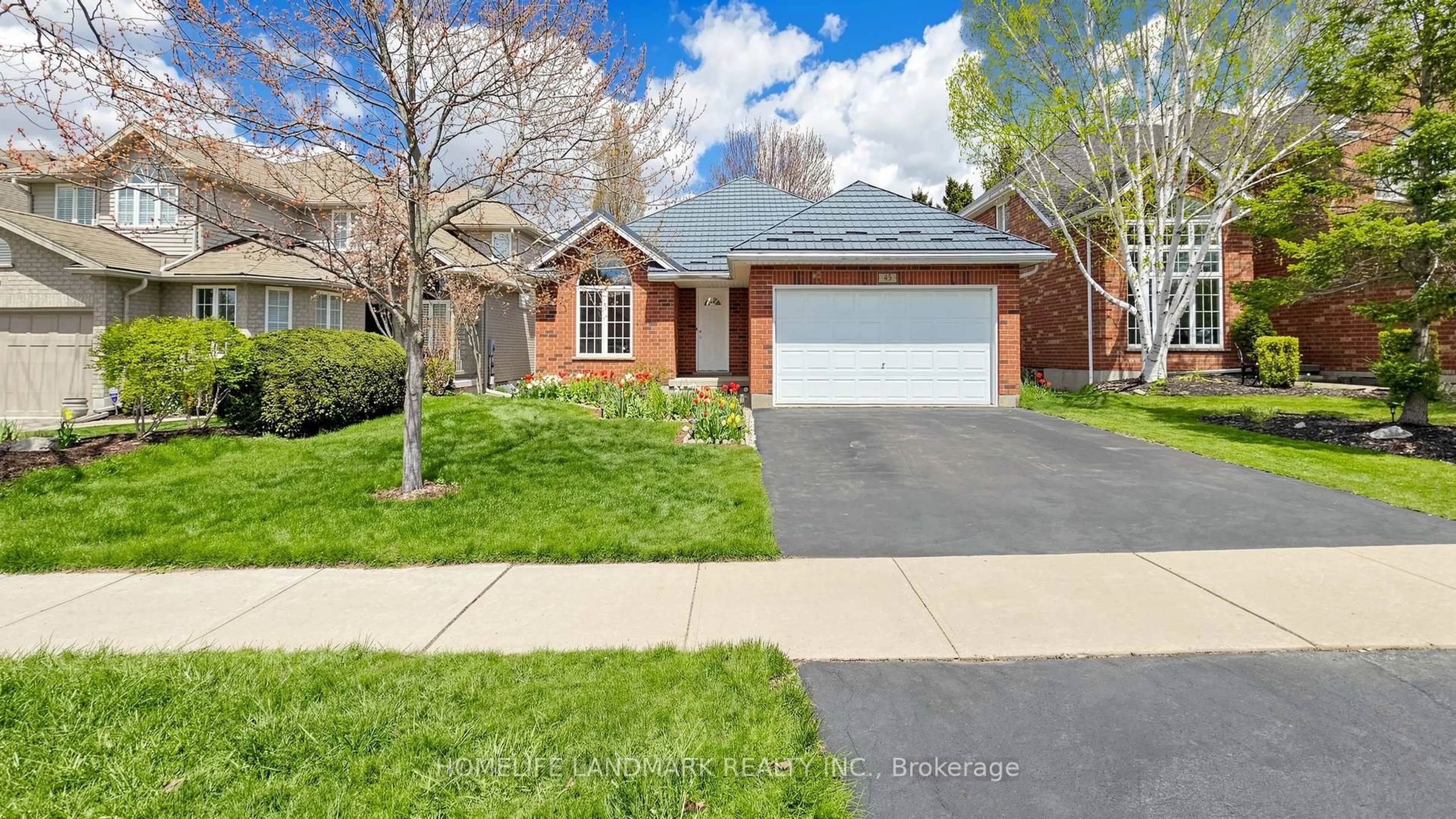 Home with brick exterior material, street for 45 Pheasant Run Dr, Guelph Ontario N1C 1E7