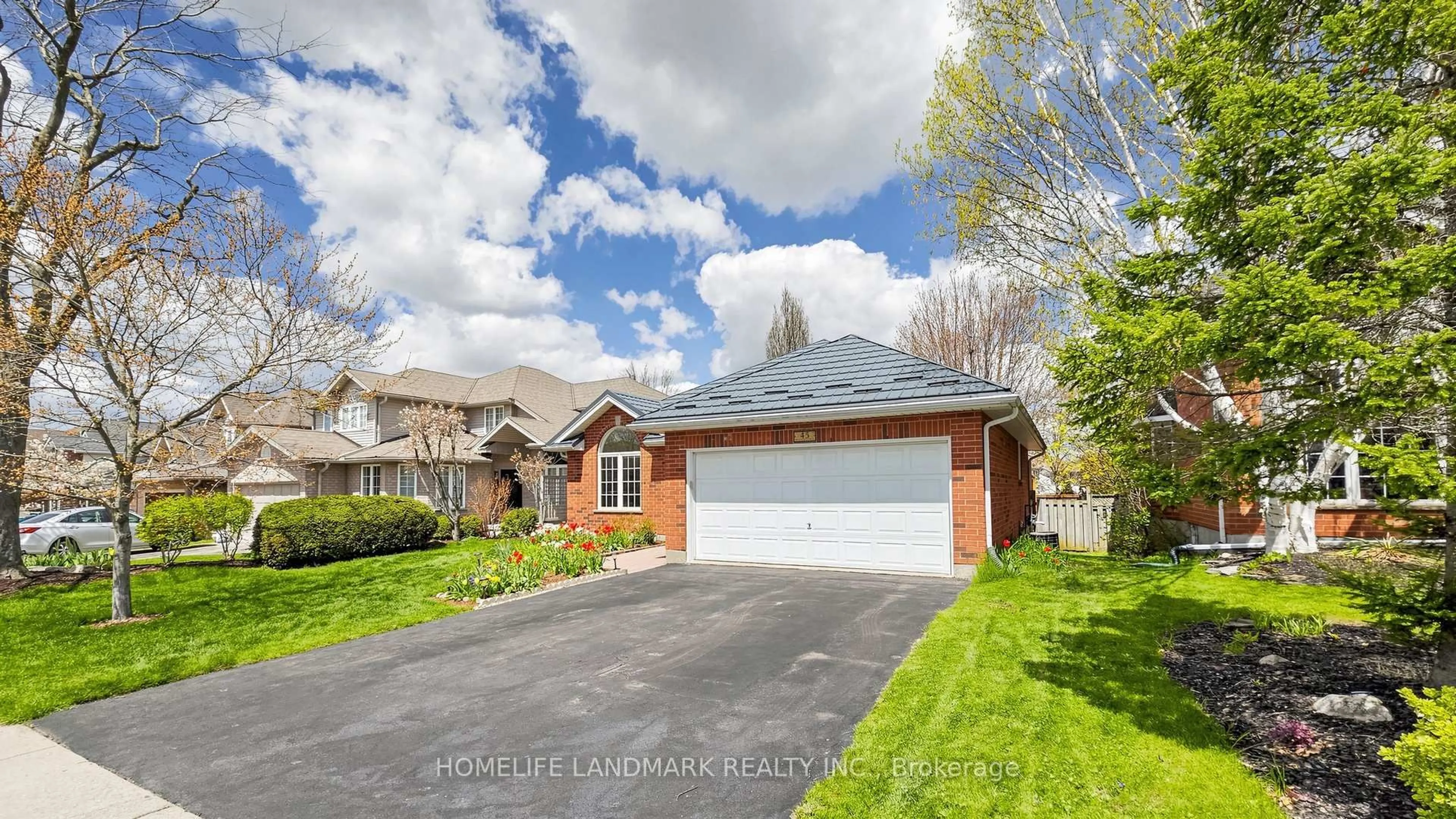 Home with brick exterior material, street for 45 Pheasant Run Dr, Guelph Ontario N1C 1E7