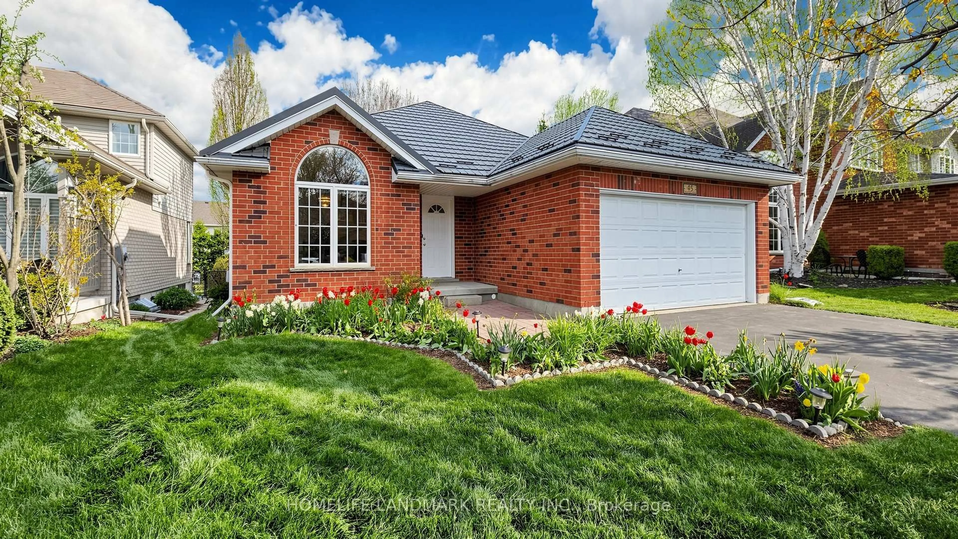 Home with brick exterior material, street for 45 Pheasant Run Dr, Guelph Ontario N1C 1E7