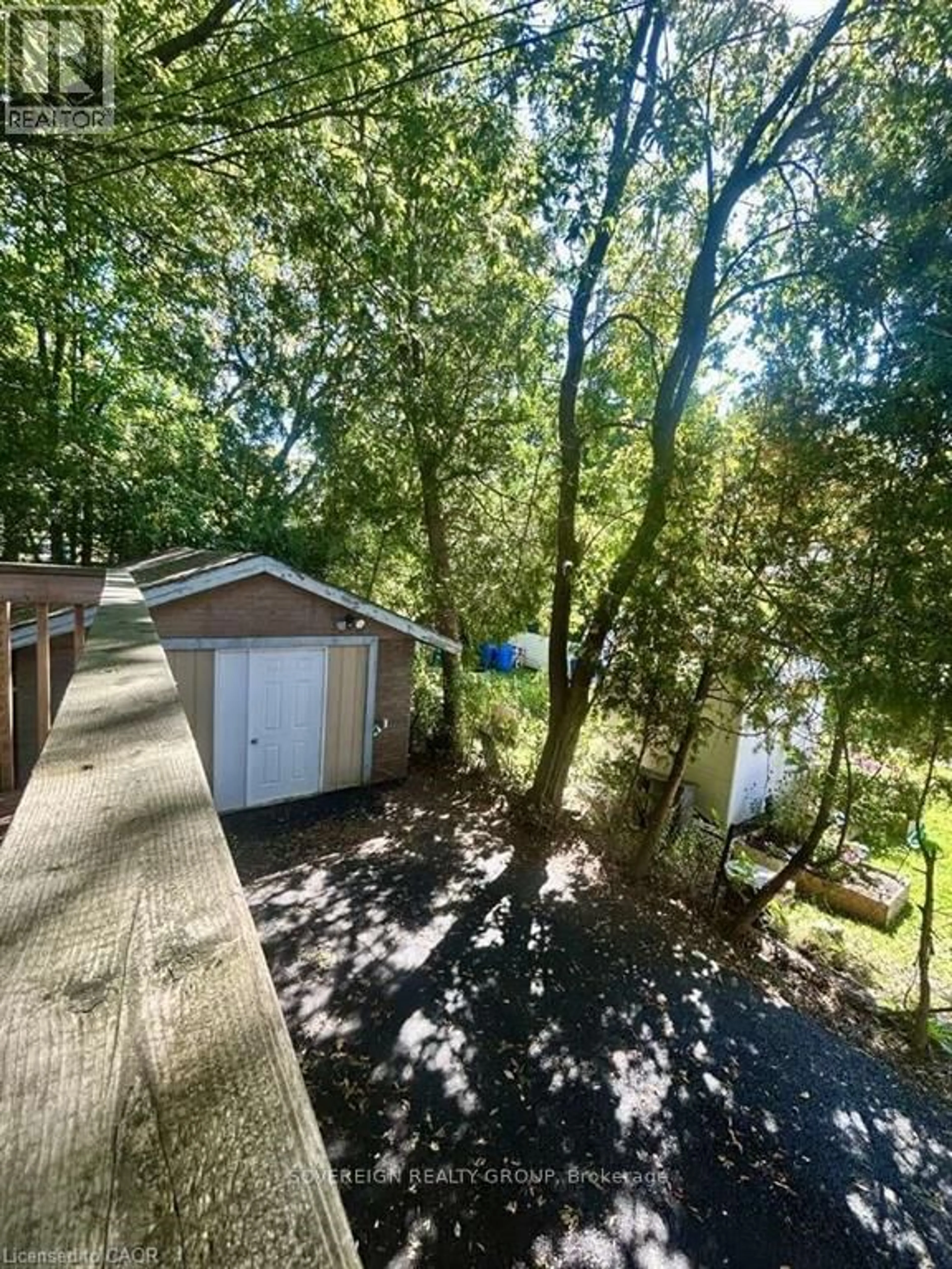 A pic from outside/outdoor area/front of a property/back of a property/a pic from drone, forest/trees view for 740 Charlotte St, Greater Sudbury Ontario P3E 4C3