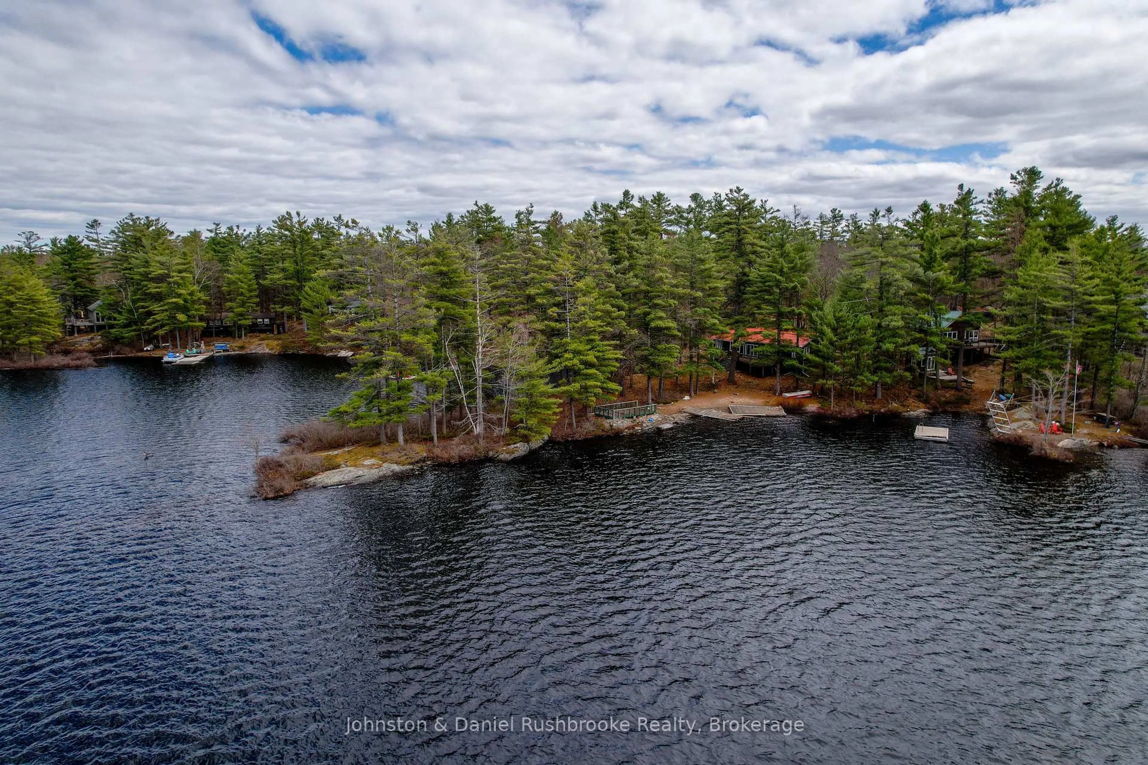 A pic from outside/outdoor area/front of a property/back of a property/a pic from drone, water/lake/river/ocean view for 1233 S Kahshe Lake Rd, Gravenhurst Ontario P0E 1G0