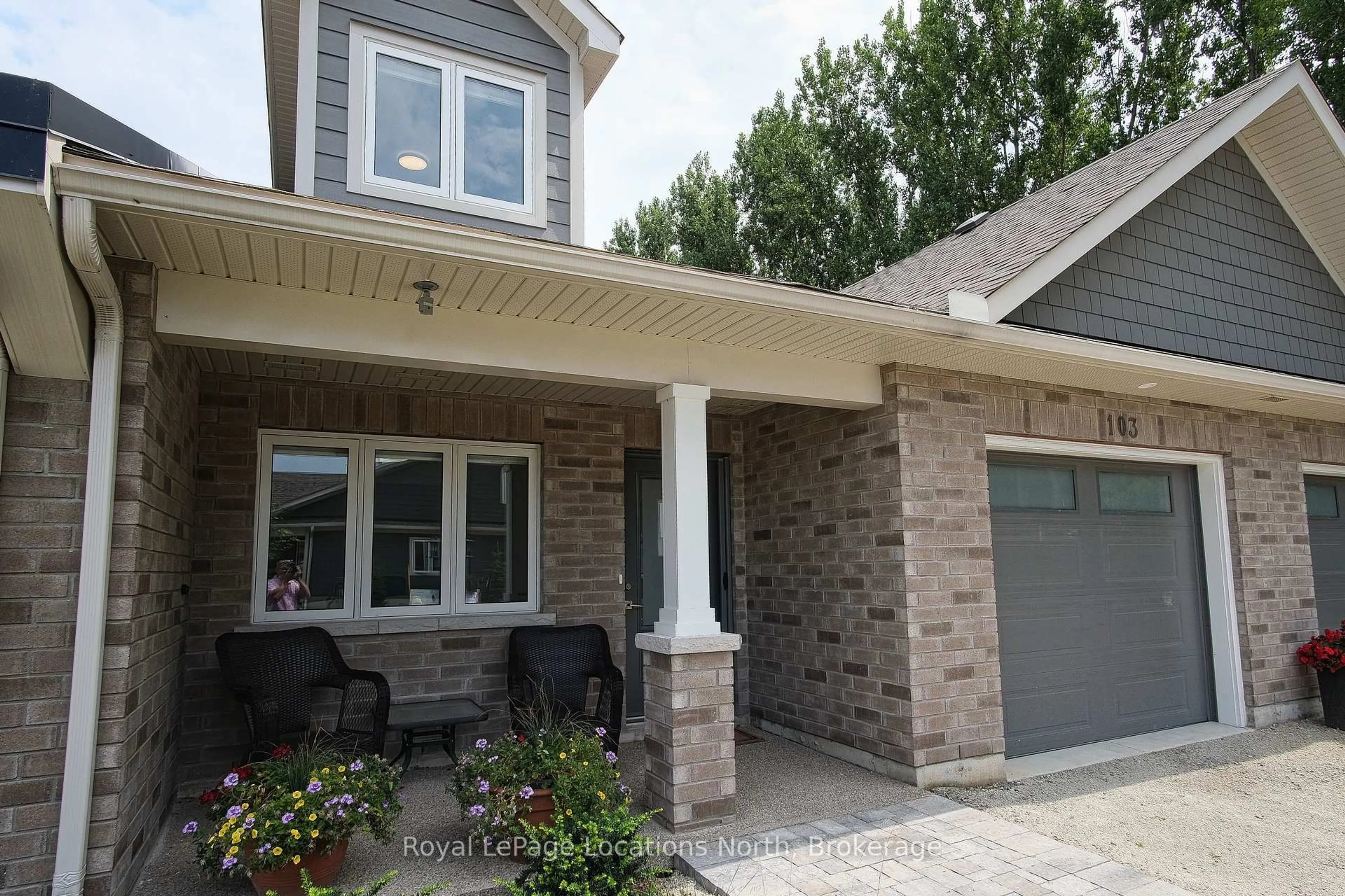 Home with brick exterior material, street for 103 Dove Dr, Blue Mountains Ontario N0H 2P0