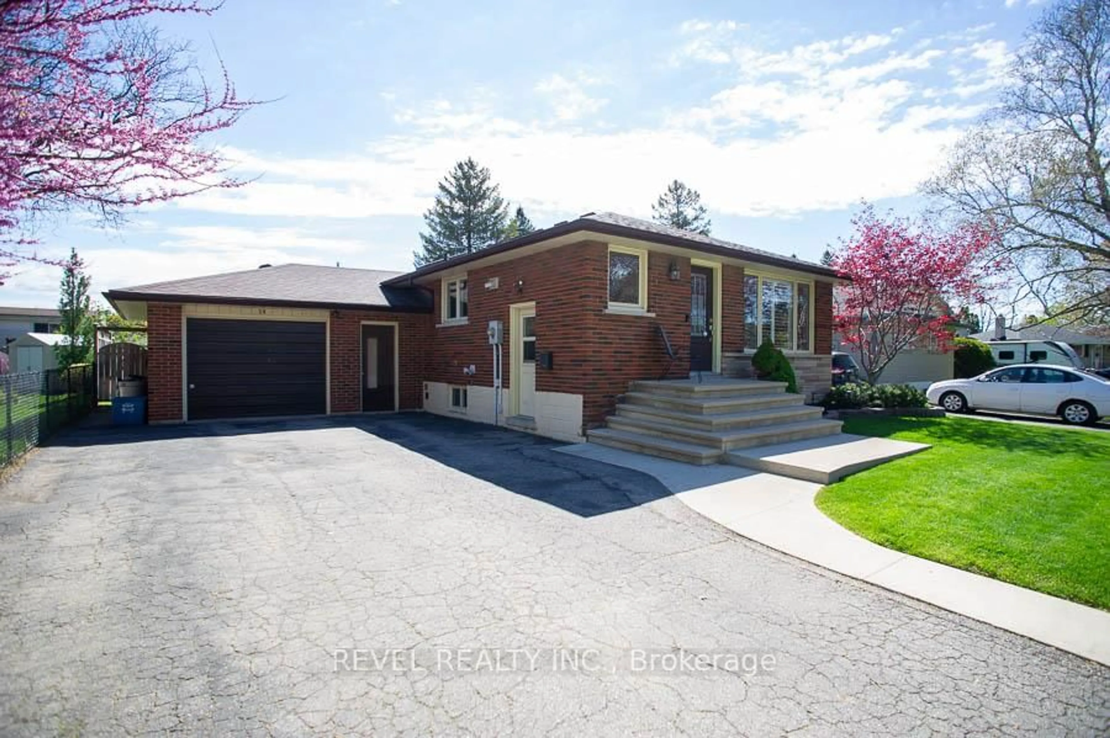 Home with brick exterior material, street for 59 Wiltshire Dr, Brantford Ontario N3R 5B1