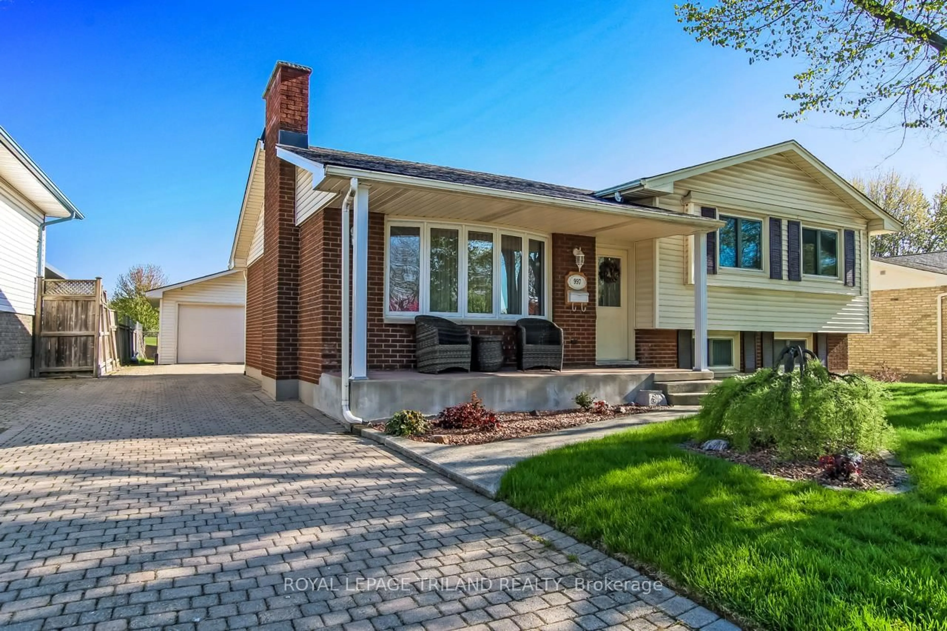 Home with brick exterior material, street for 997 Osgoode Dr, London South Ontario N6E 1C9