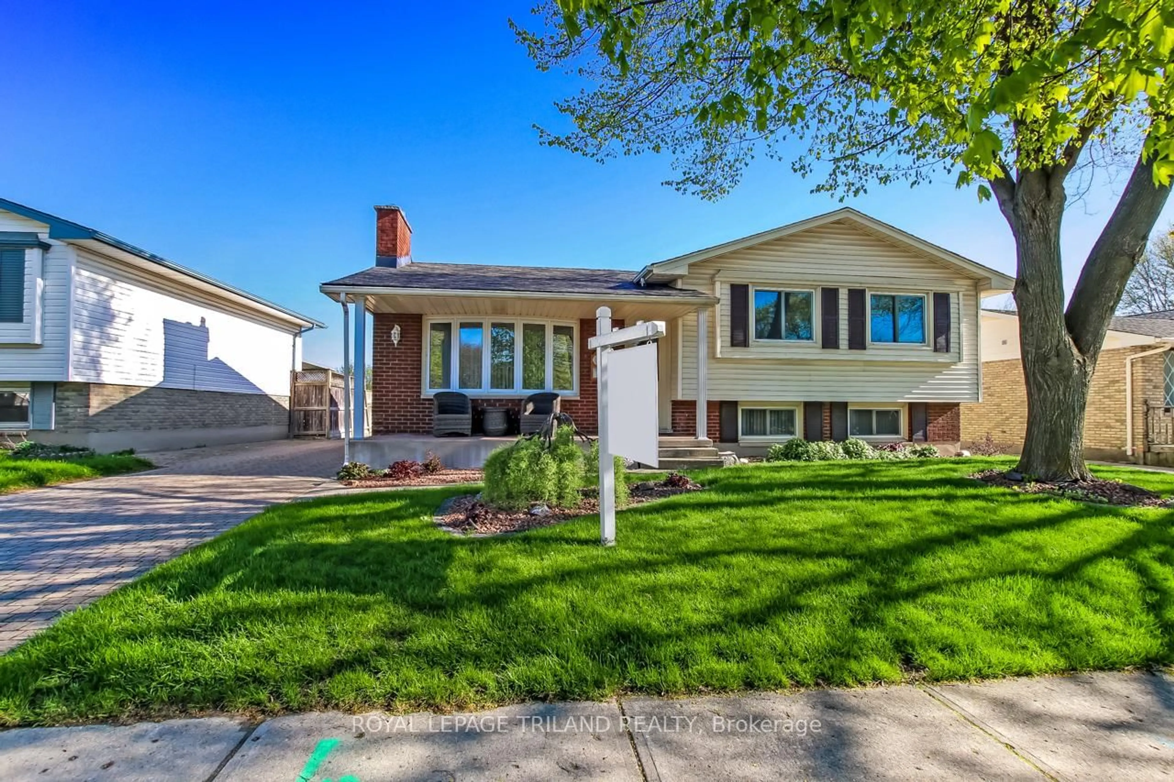 Home with brick exterior material, street for 997 Osgoode Dr, London South Ontario N6E 1C9