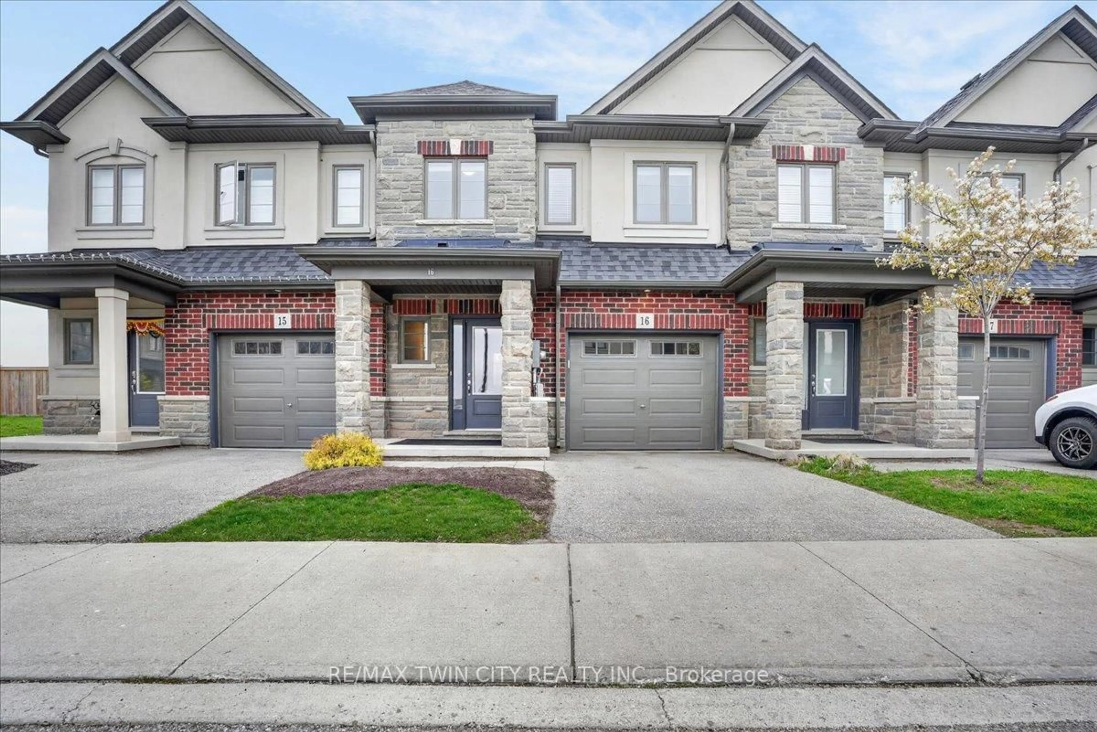 Home with brick exterior material, street for 324 Equestrian Way #16, Cambridge Ontario N3E 0E2