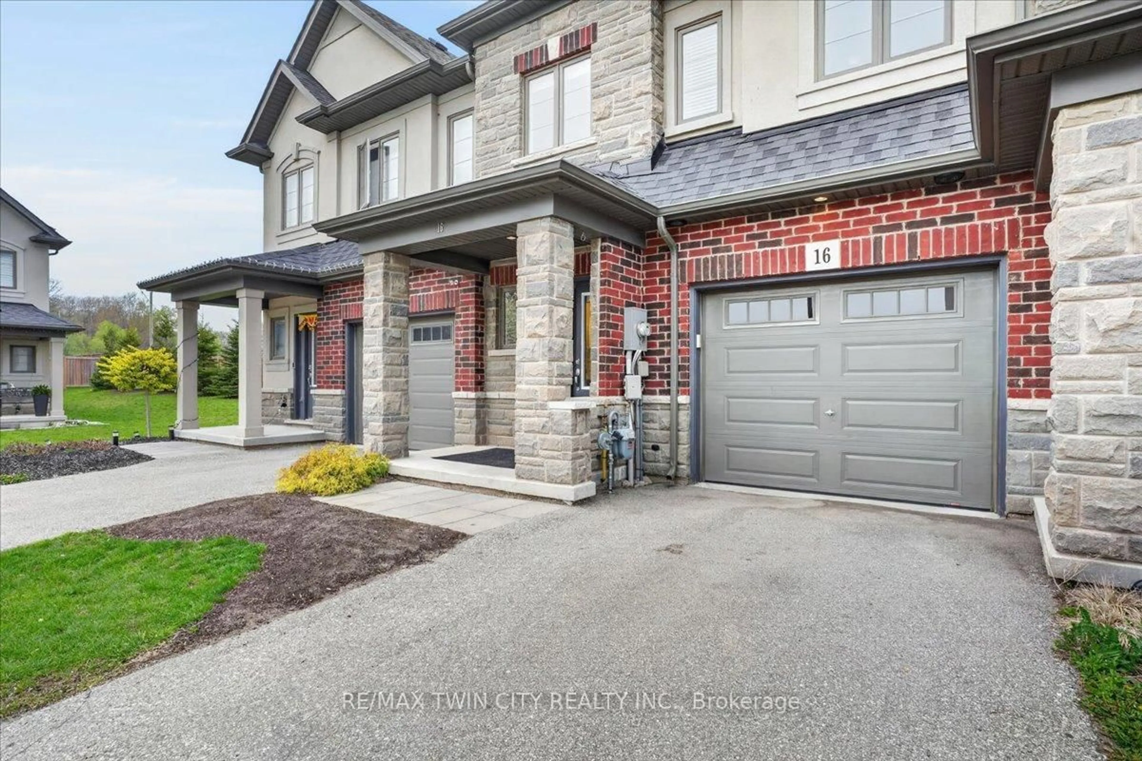 Home with brick exterior material, street for 324 Equestrian Way #16, Cambridge Ontario N3E 0E2