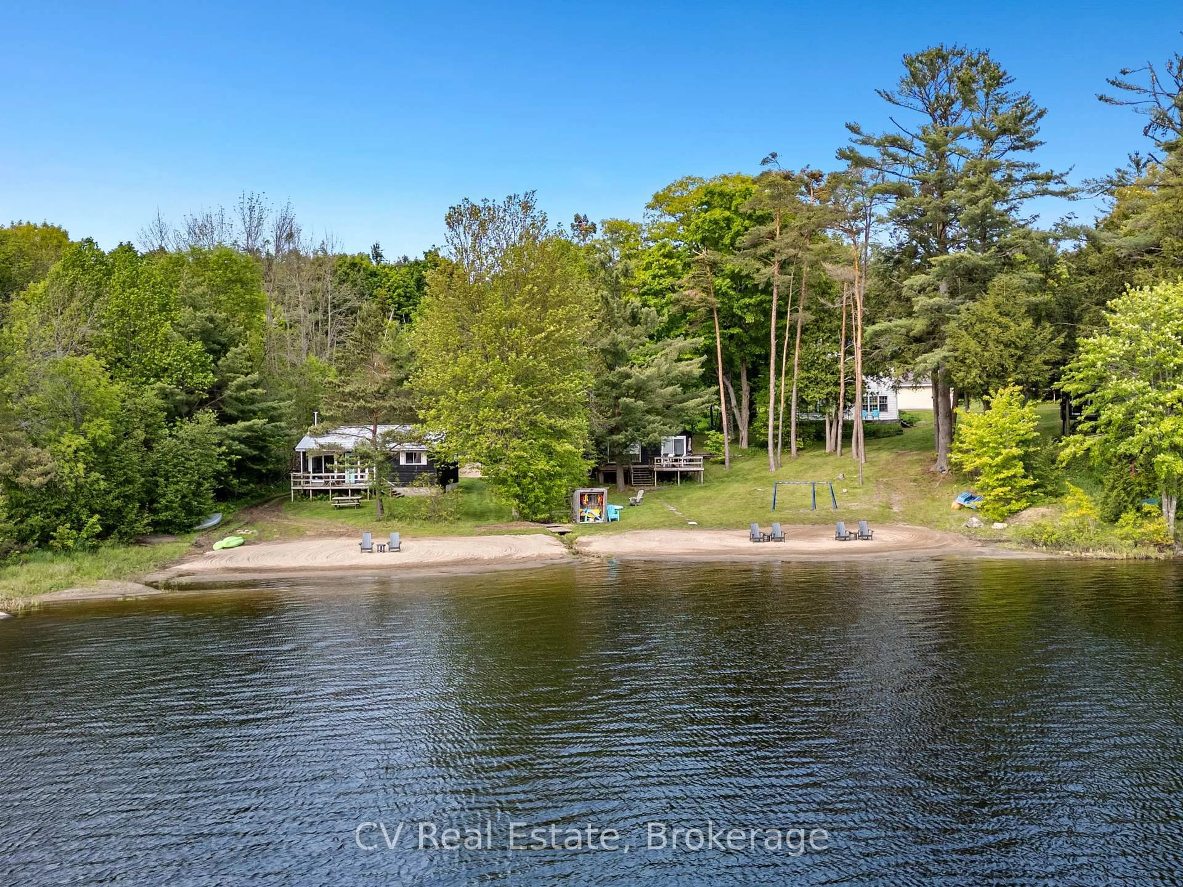 A pic from outside/outdoor area/front of a property/back of a property/a pic from drone, water/lake/river/ocean view for 1113 Moon River Rd, Muskoka Lakes Ontario P0C 1A0