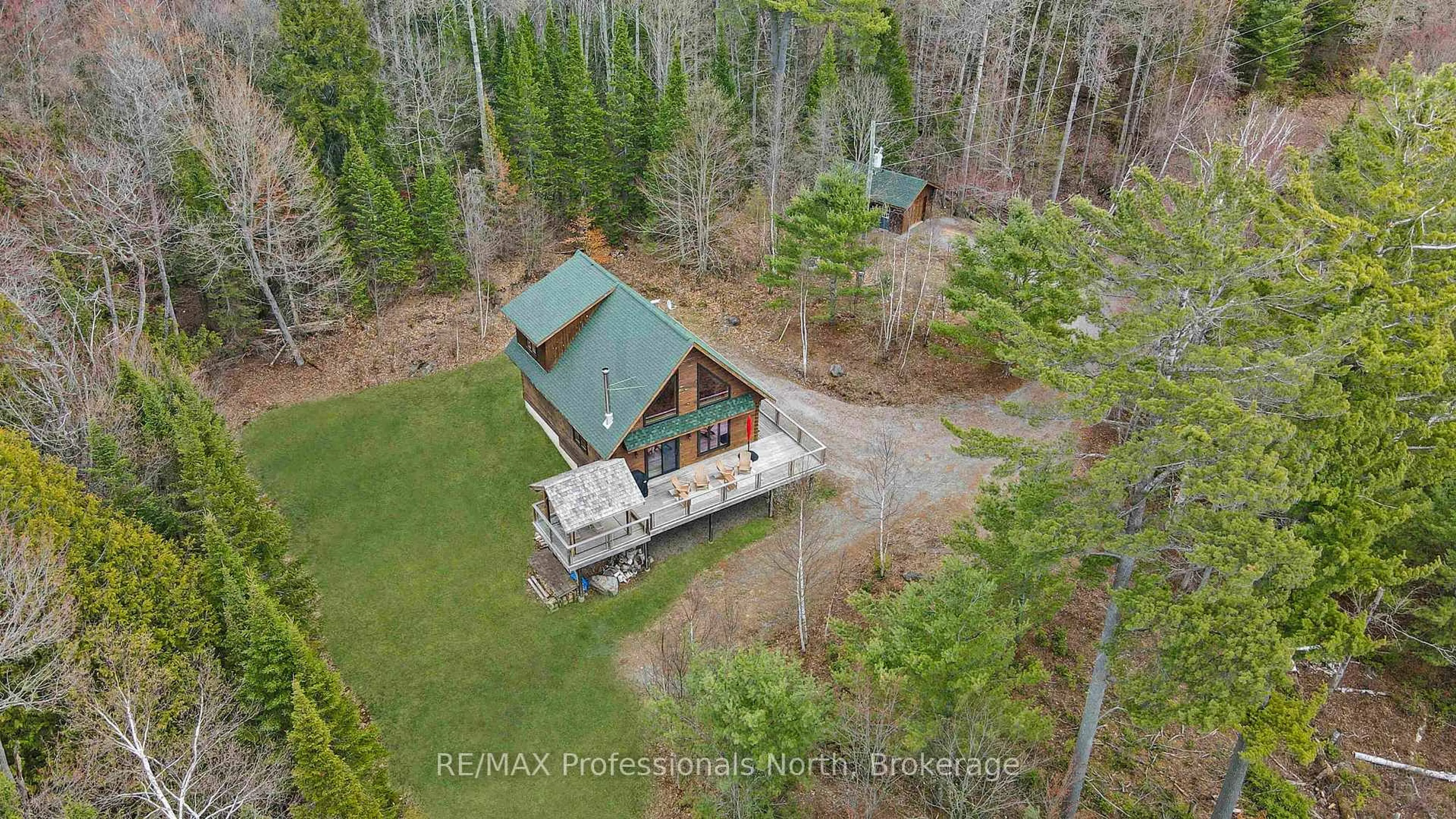 A pic from outside/outdoor area/front of a property/back of a property/a pic from drone, forest/trees view for 3047 Harburn Rd, Dysart et al Ontario K0M 1S0