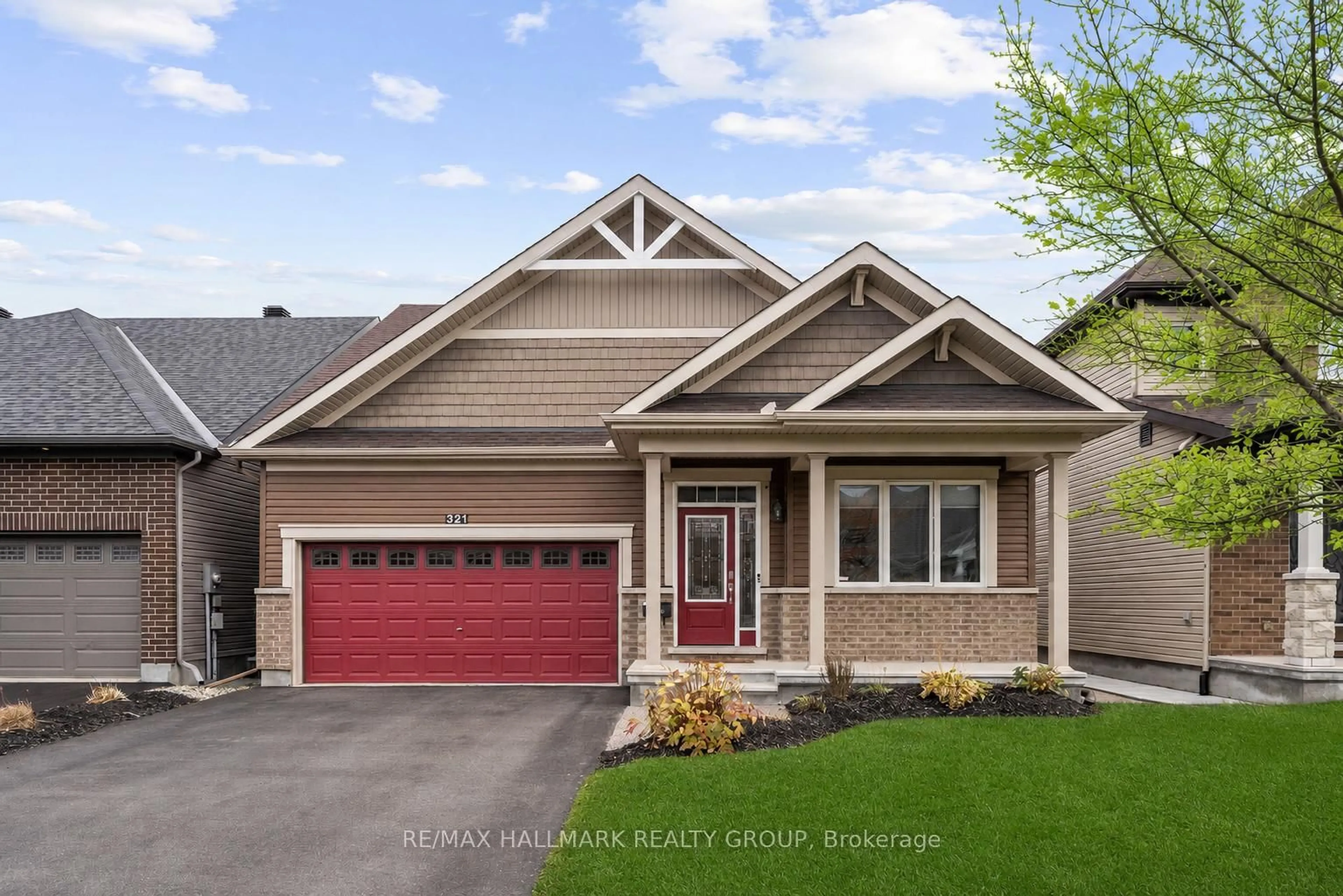 Home with vinyl exterior material, street for 321 Hepatica Way, Ottawa Ontario K4A 0Y9