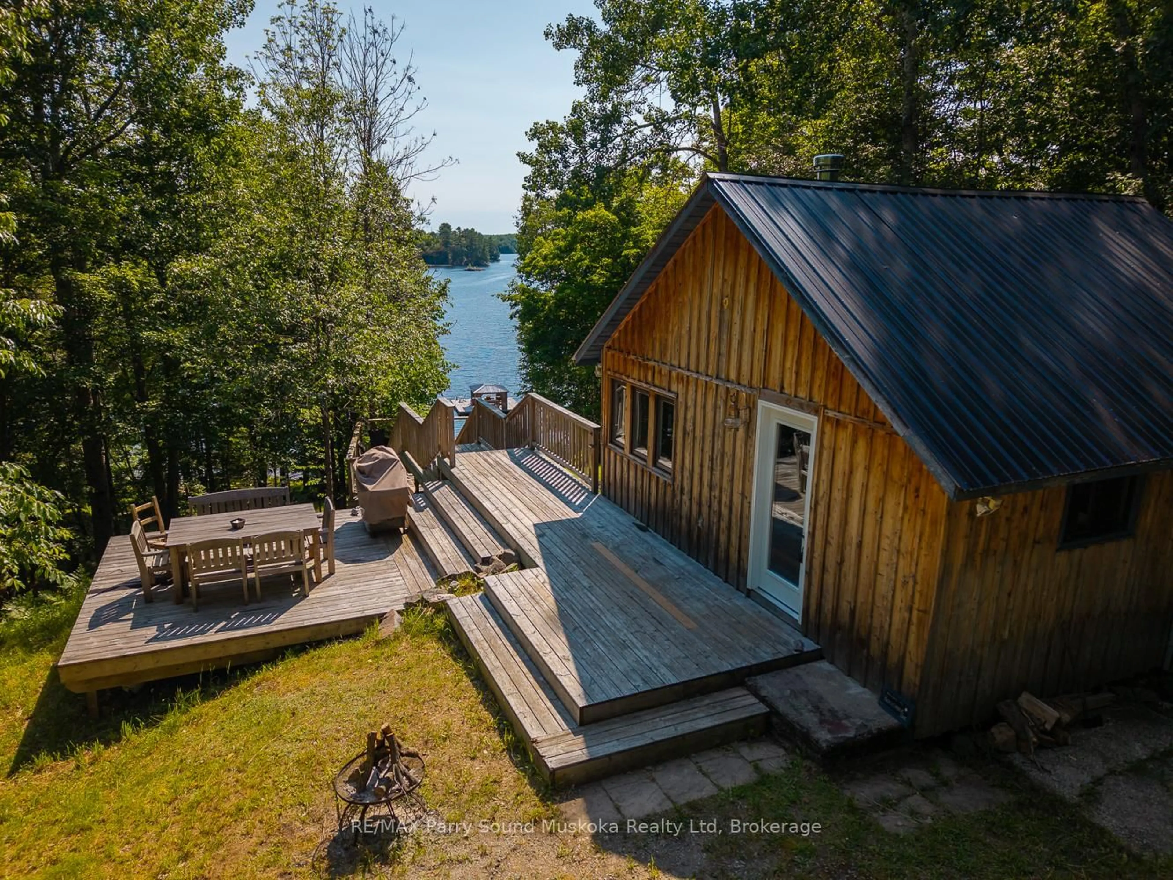 A pic from outside/outdoor area/front of a property/back of a property/a pic from drone, water/lake/river/ocean view for 274 Chur Lee Rd, Whitestone Ontario P0A 1G0