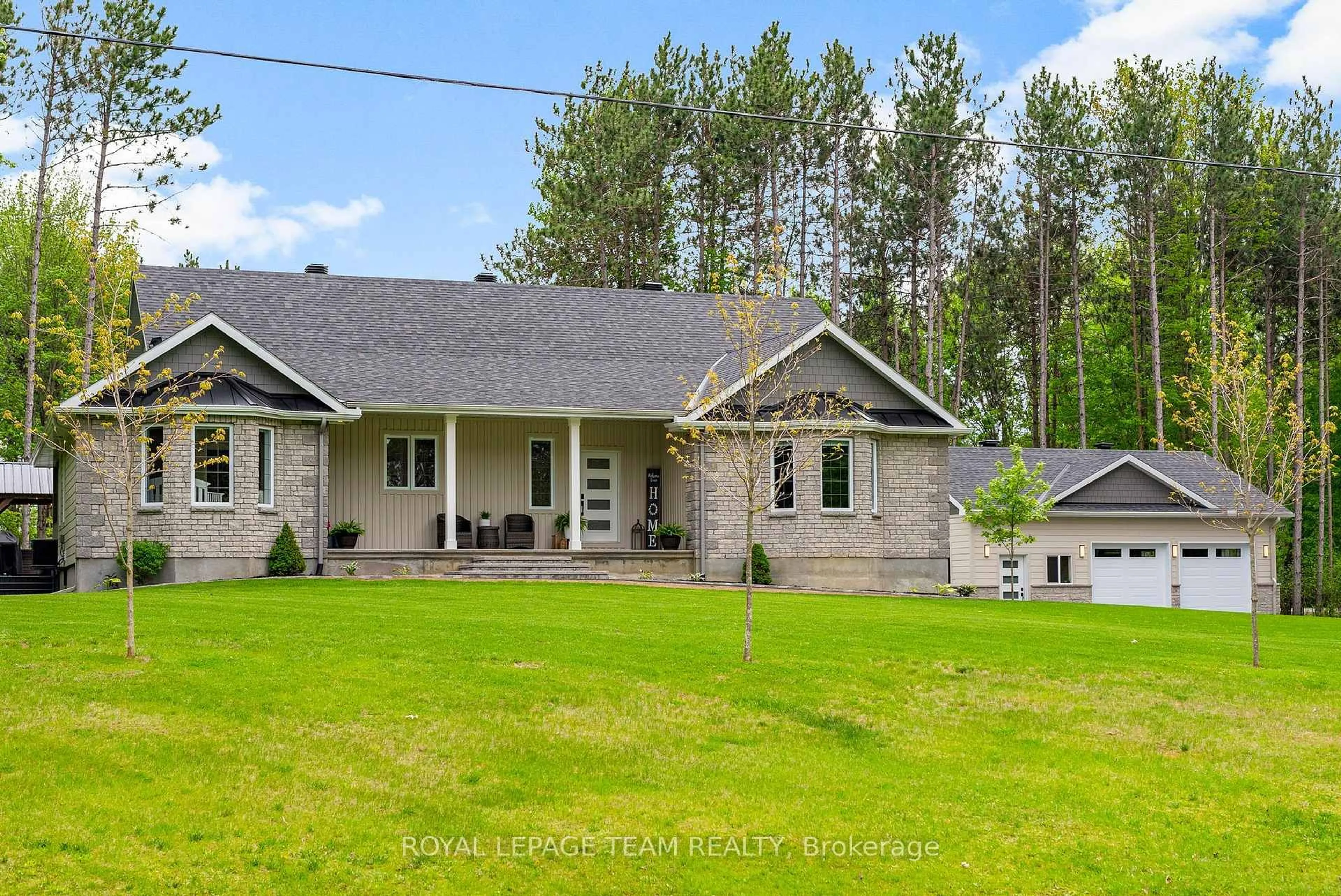 A pic from outside/outdoor area/front of a property/back of a property/a pic from drone, unknown for 108 Royal Troon Lane, Ottawa Ontario K0A 1T0