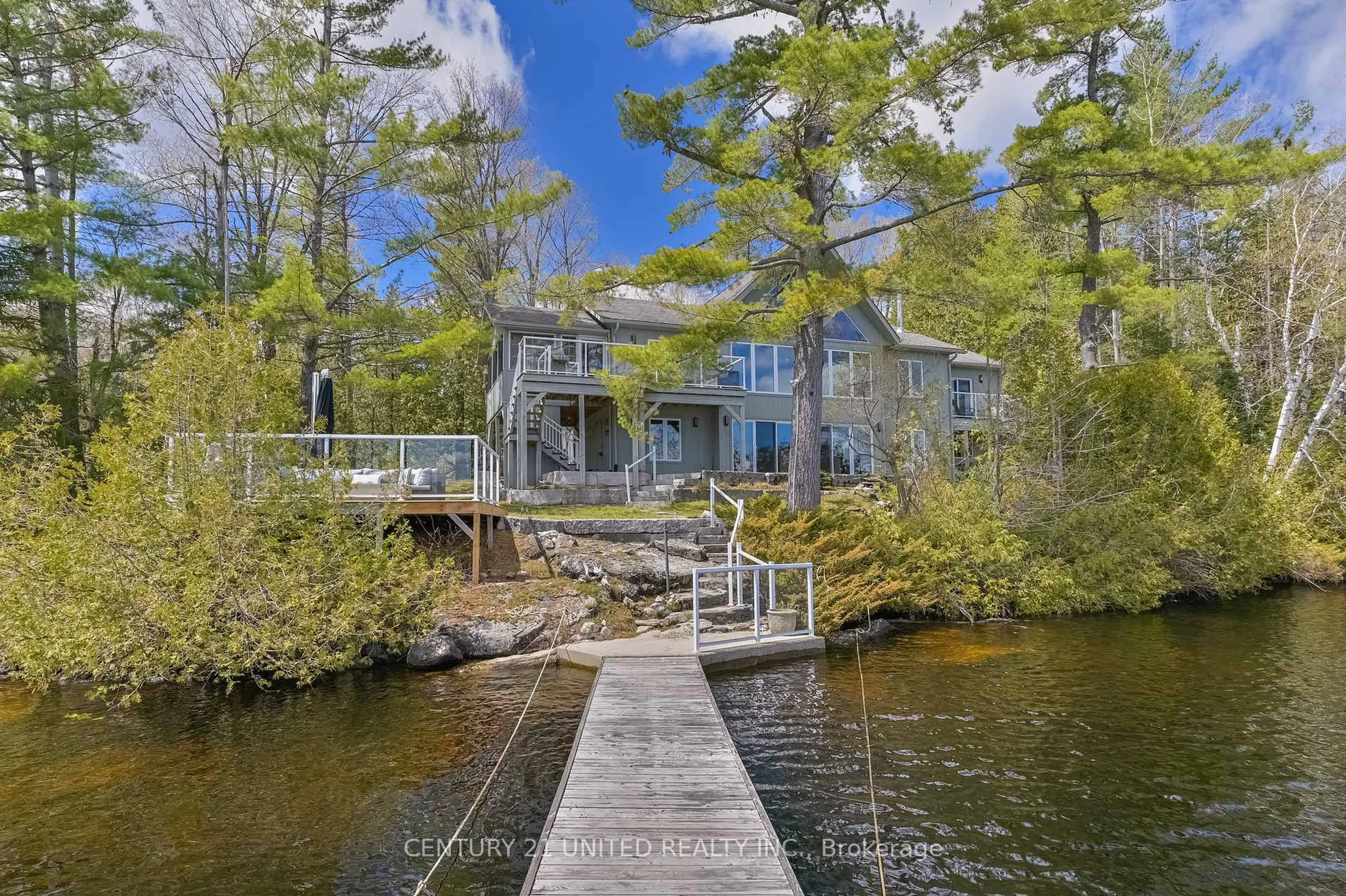 A pic from outside/outdoor area/front of a property/back of a property/a pic from drone, water/lake/river/ocean view for 3632 County Road 507, Trent Lakes Ontario K0L 1J0