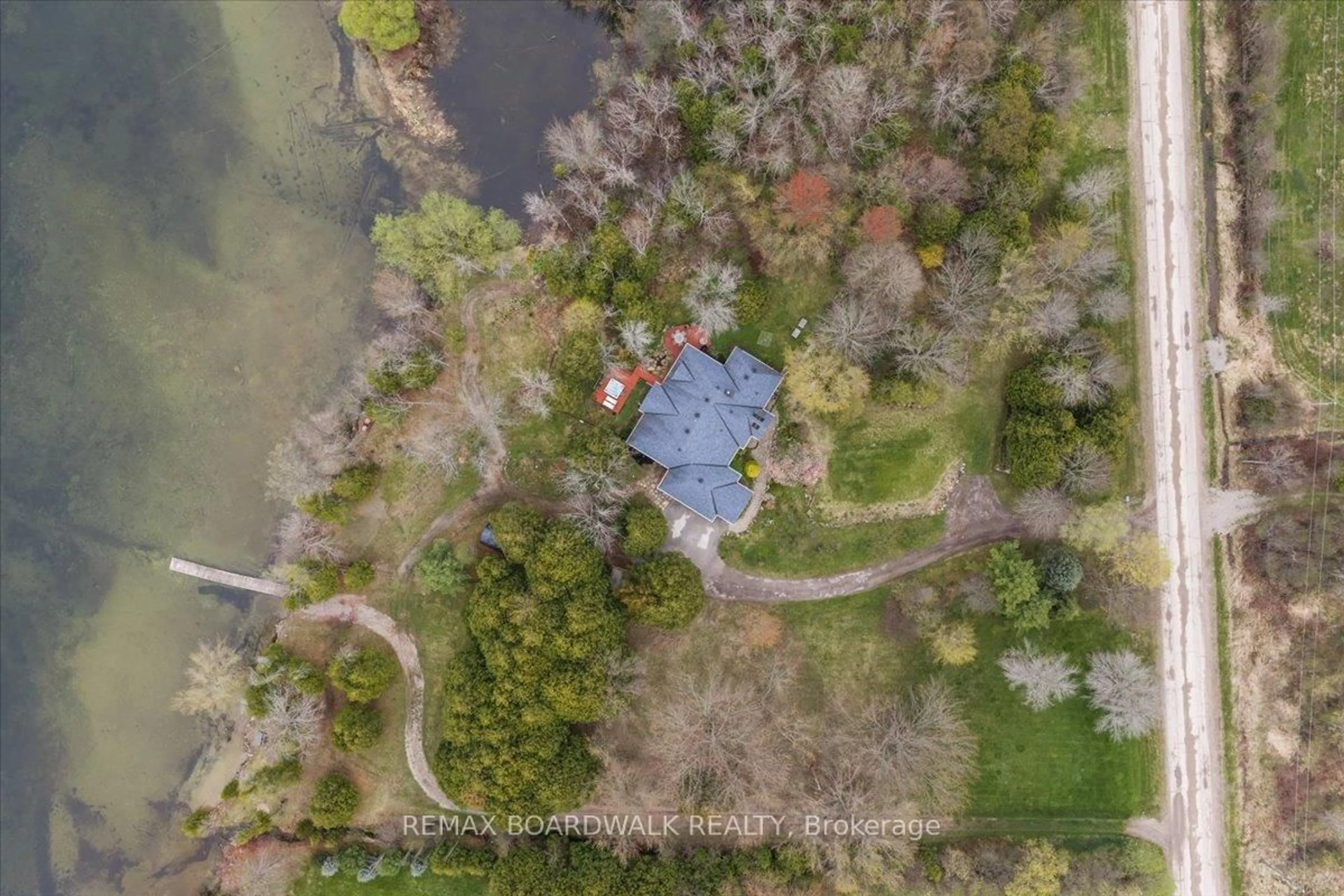A pic from outside/outdoor area/front of a property/back of a property/a pic from drone, water/lake/river/ocean view for 212 Sheldon Rd, Rideau Lakes Ontario K0G 1V0