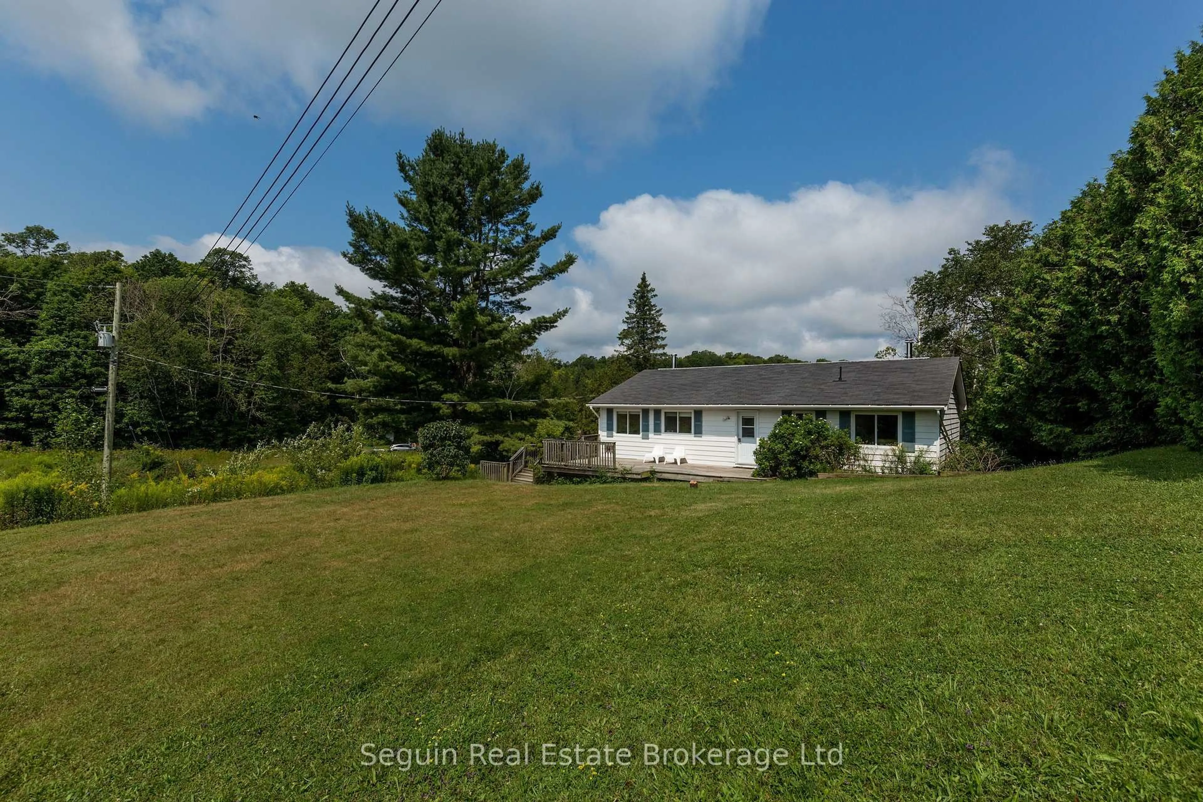 A pic from outside/outdoor area/front of a property/back of a property/a pic from drone, water/lake/river/ocean view for 14 Jordan Lane, Seguin Ontario P2A 0B6