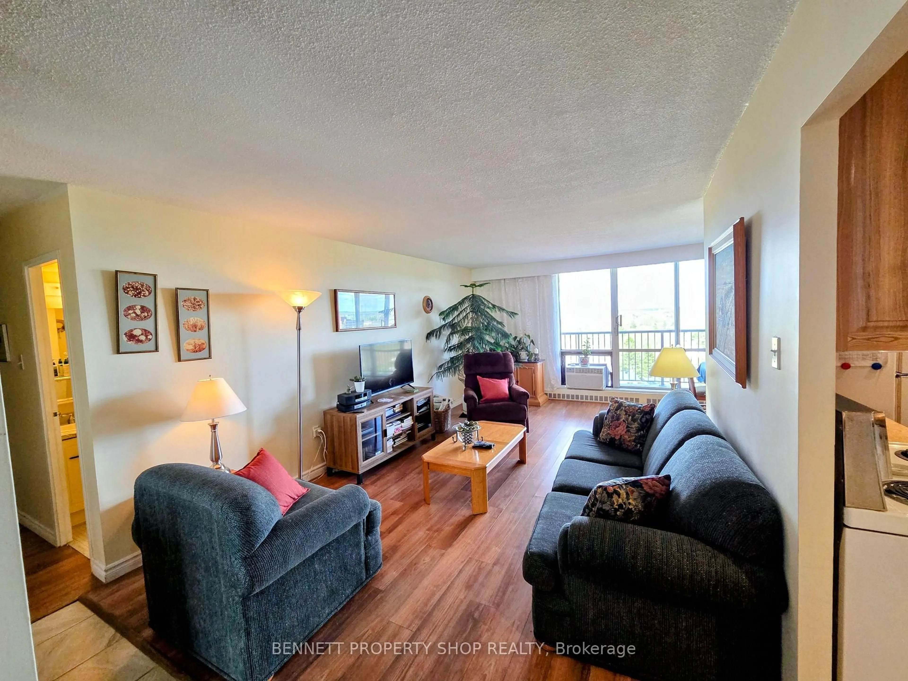 Living room with furniture, unknown for 2400 Virginia Dr #1007, Ottawa Ontario K1H 8L3
