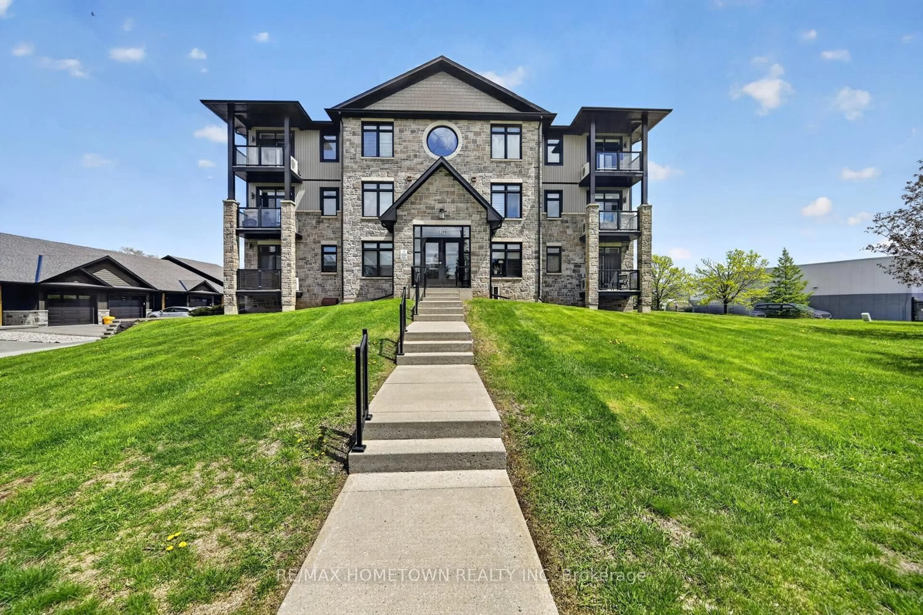 A pic from outside/outdoor area/front of a property/back of a property/a pic from drone, unknown for 1109 Millwood Ave #101, Brockville Ontario K6V 0C7