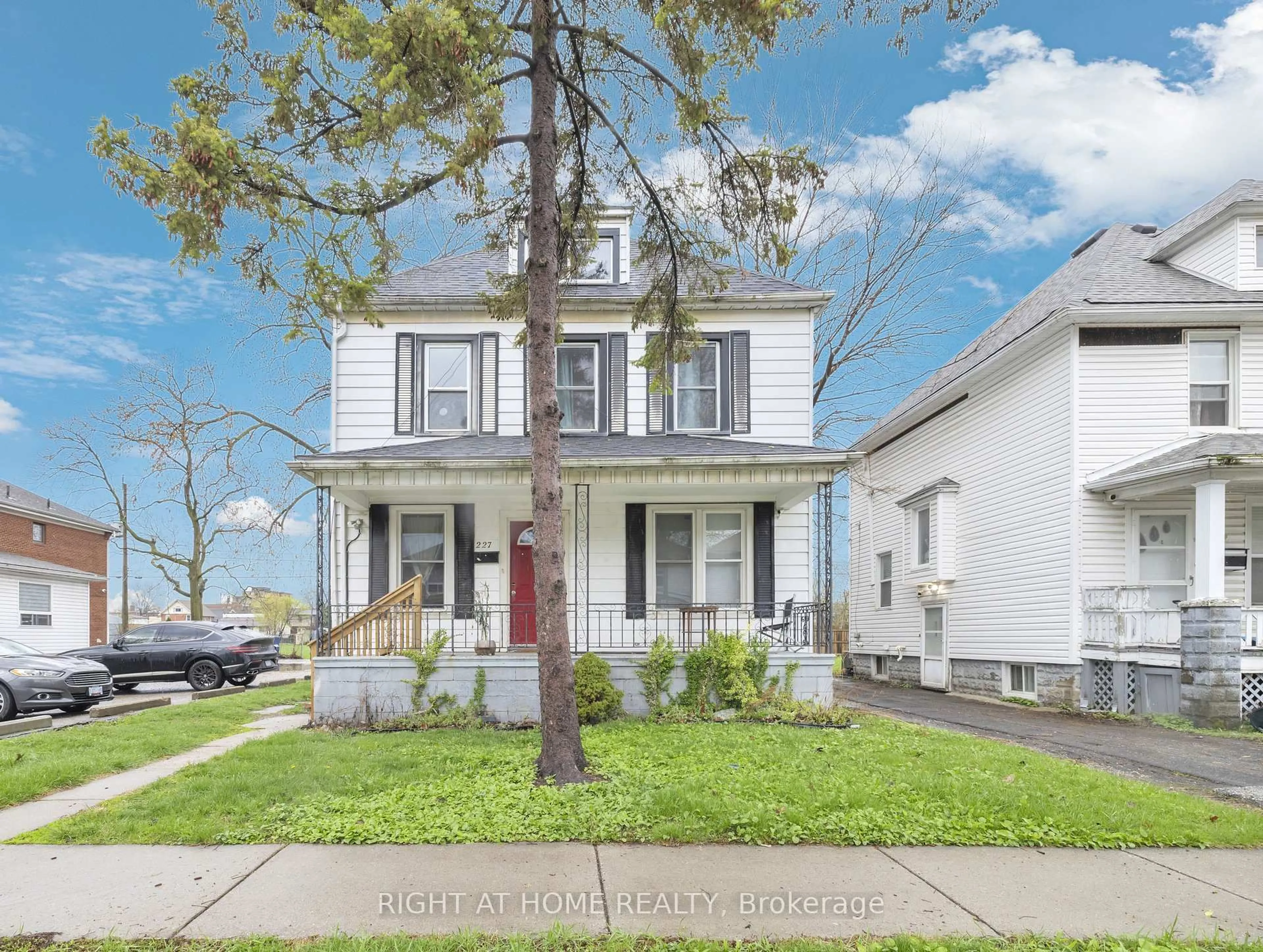 Home with vinyl exterior material, street for 227 Bridge Ave, Windsor Ontario N9B 2M1