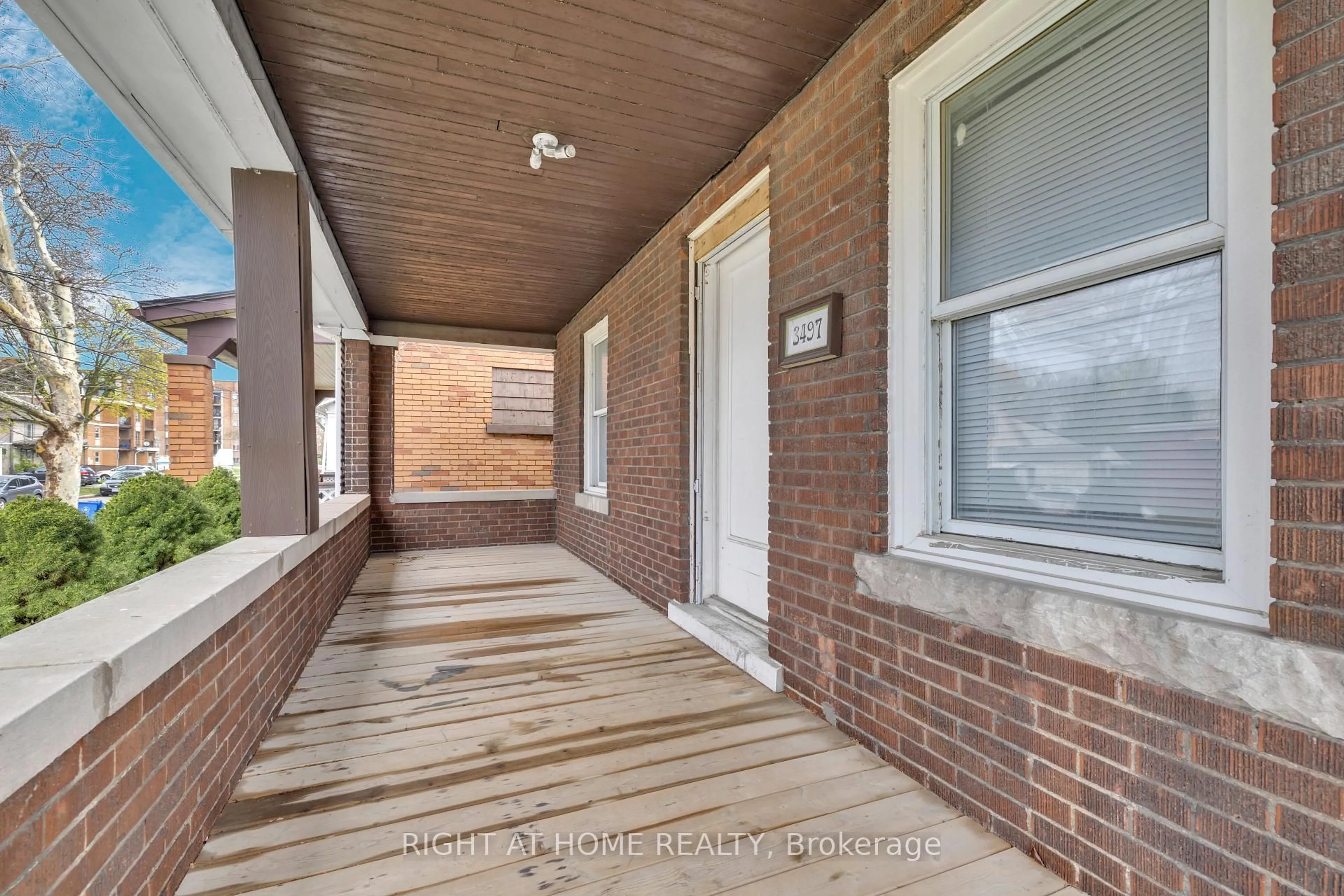 Home with brick exterior material, street for 3497 Peter St, Windsor Ontario N9C 1J4