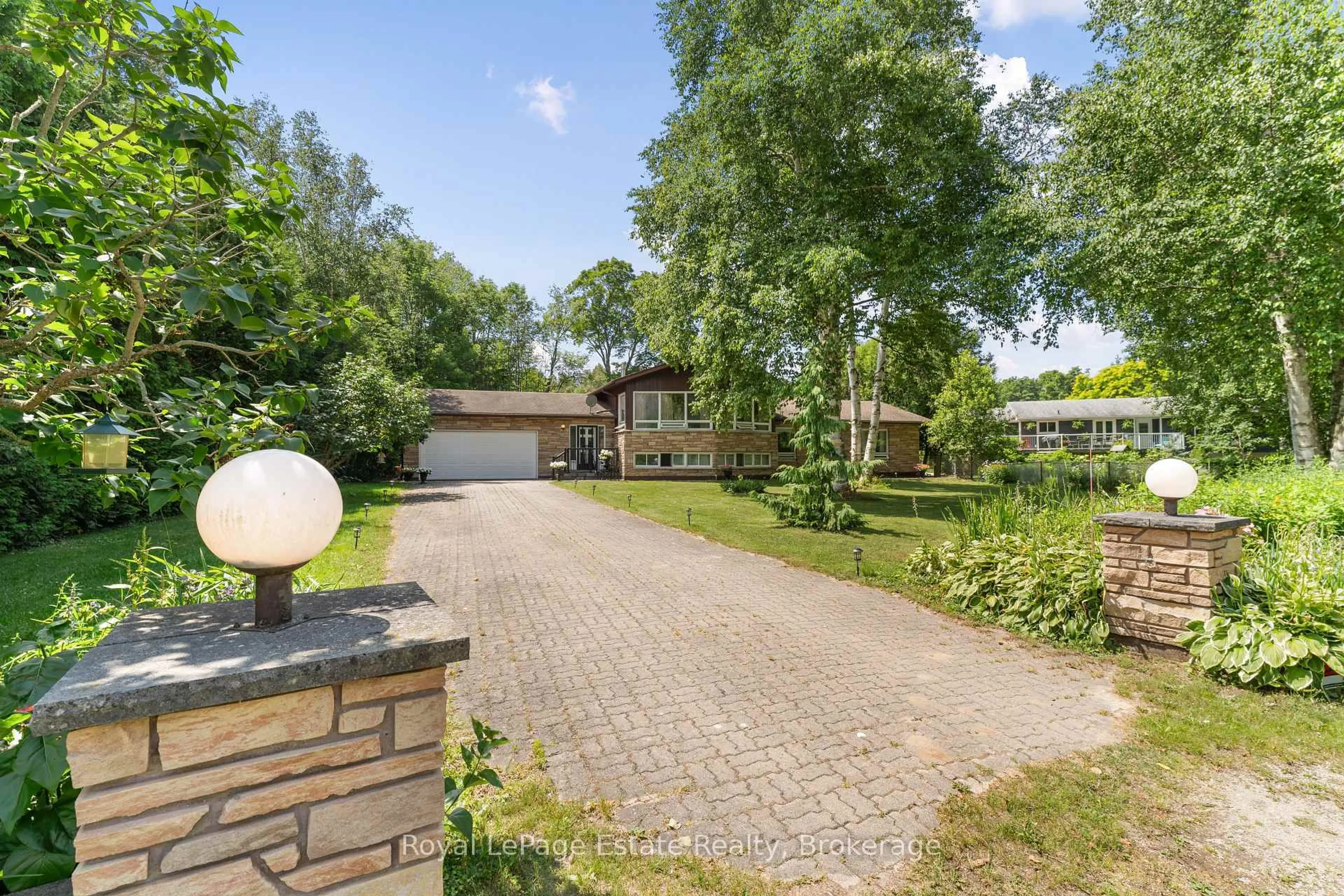 A pic from outside/outdoor area/front of a property/back of a property/a pic from drone, street for 97 Dorena Cres, South Bruce Peninsula Ontario N0H 2G0