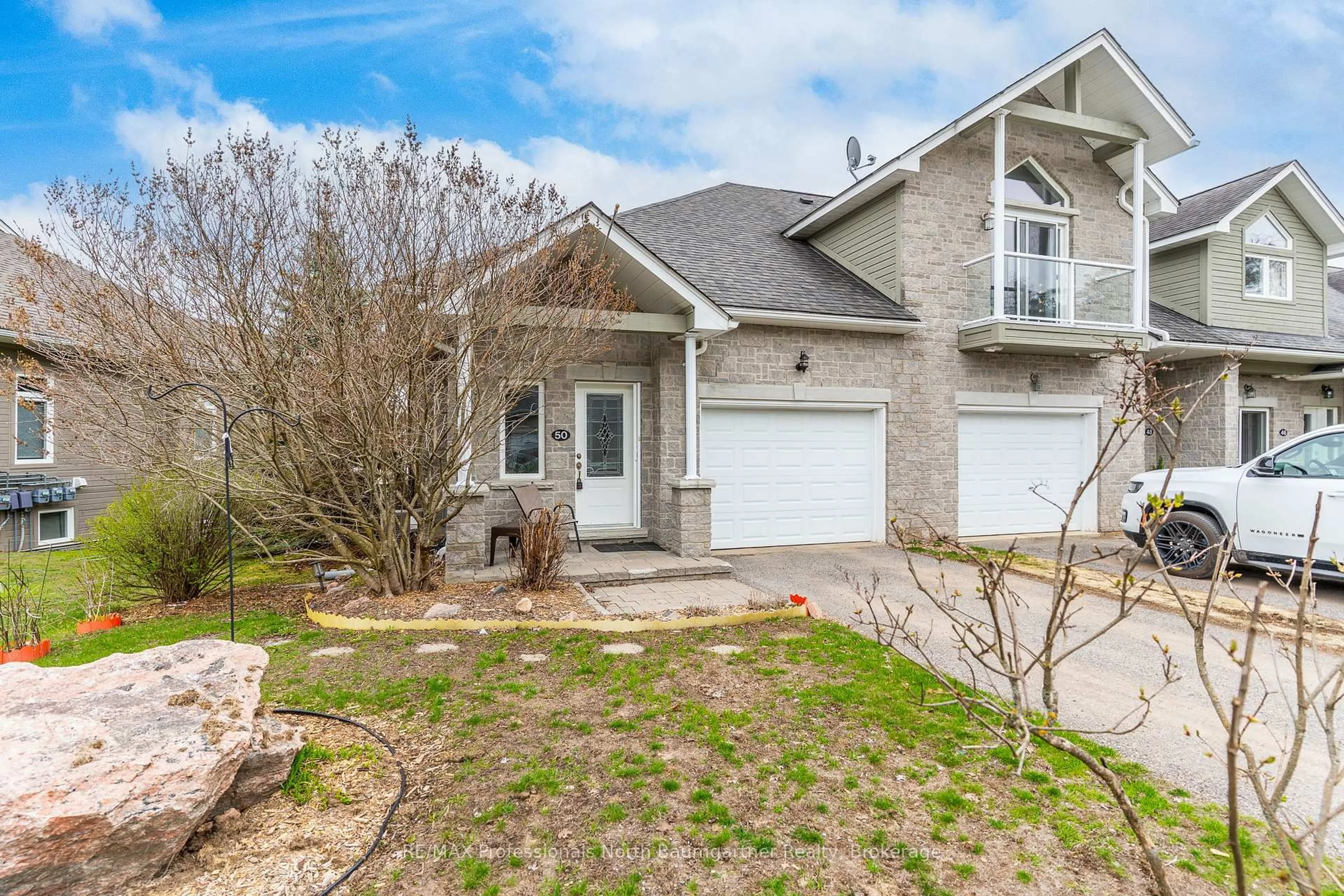 Home with brick exterior material, street for 50 Webb Circ, Dysart et al Ontario K0M 1S0