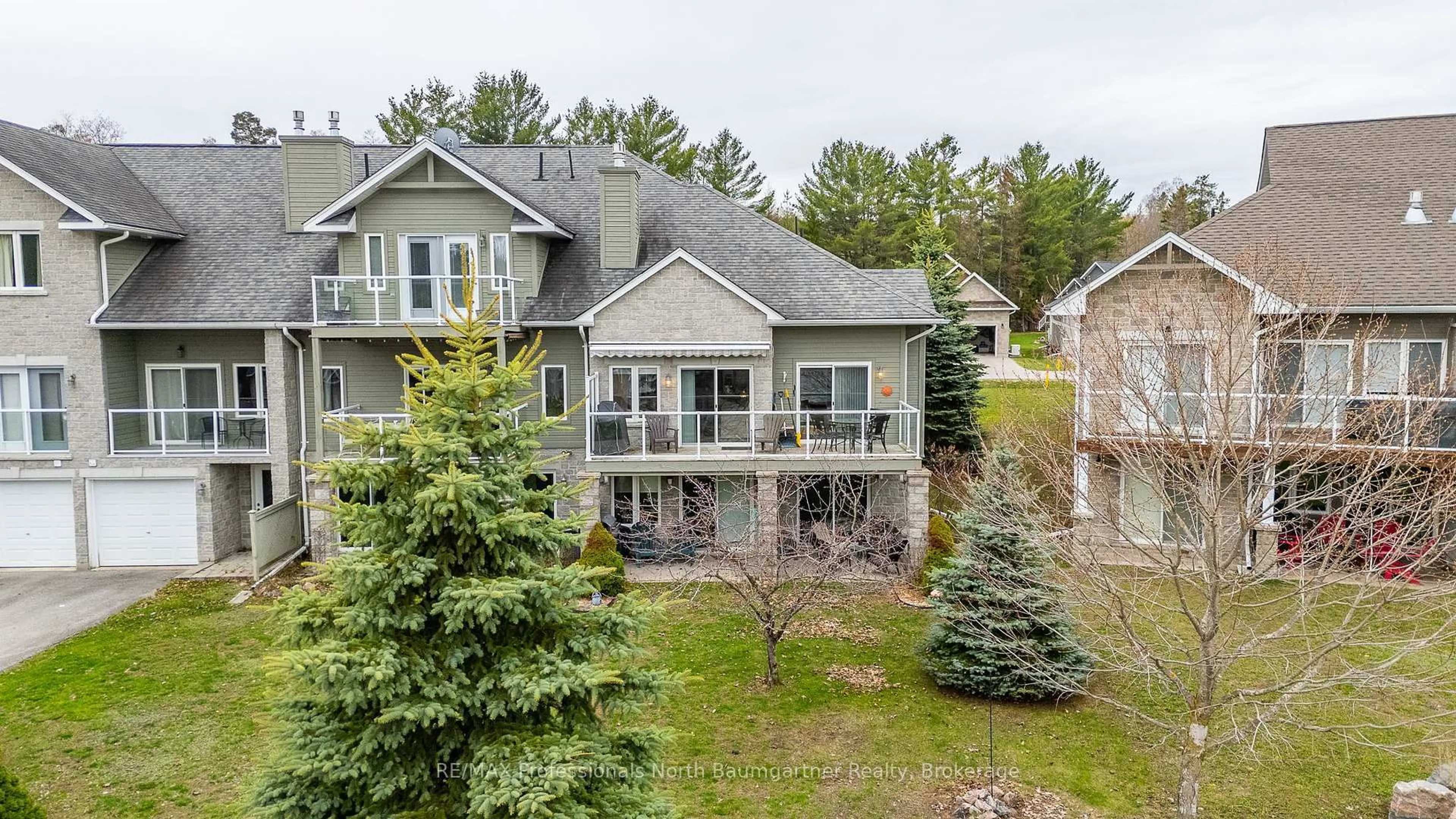A pic from outside/outdoor area/front of a property/back of a property/a pic from drone, water/lake/river/ocean view for 50 Webb Circ, Dysart et al Ontario K0M 1S0