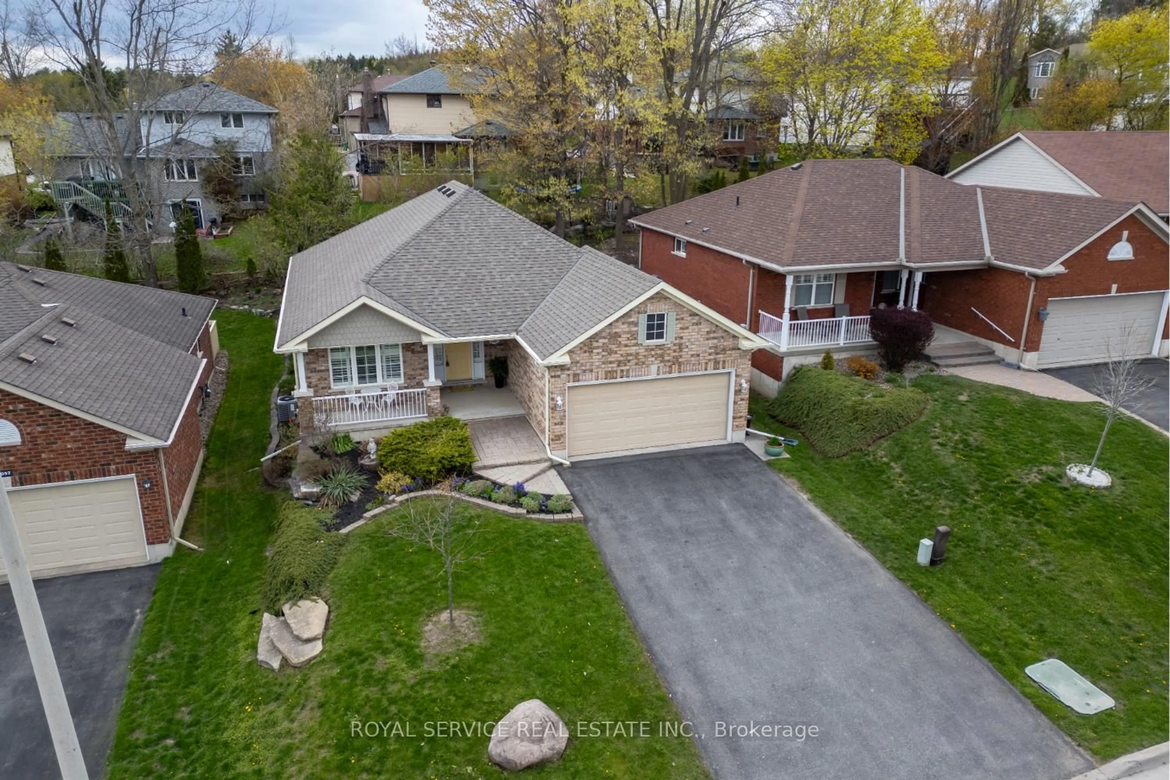 A pic from outside/outdoor area/front of a property/back of a property/a pic from drone, street for 1061 Silverdale Rd, Peterborough Ontario K9J 7W5