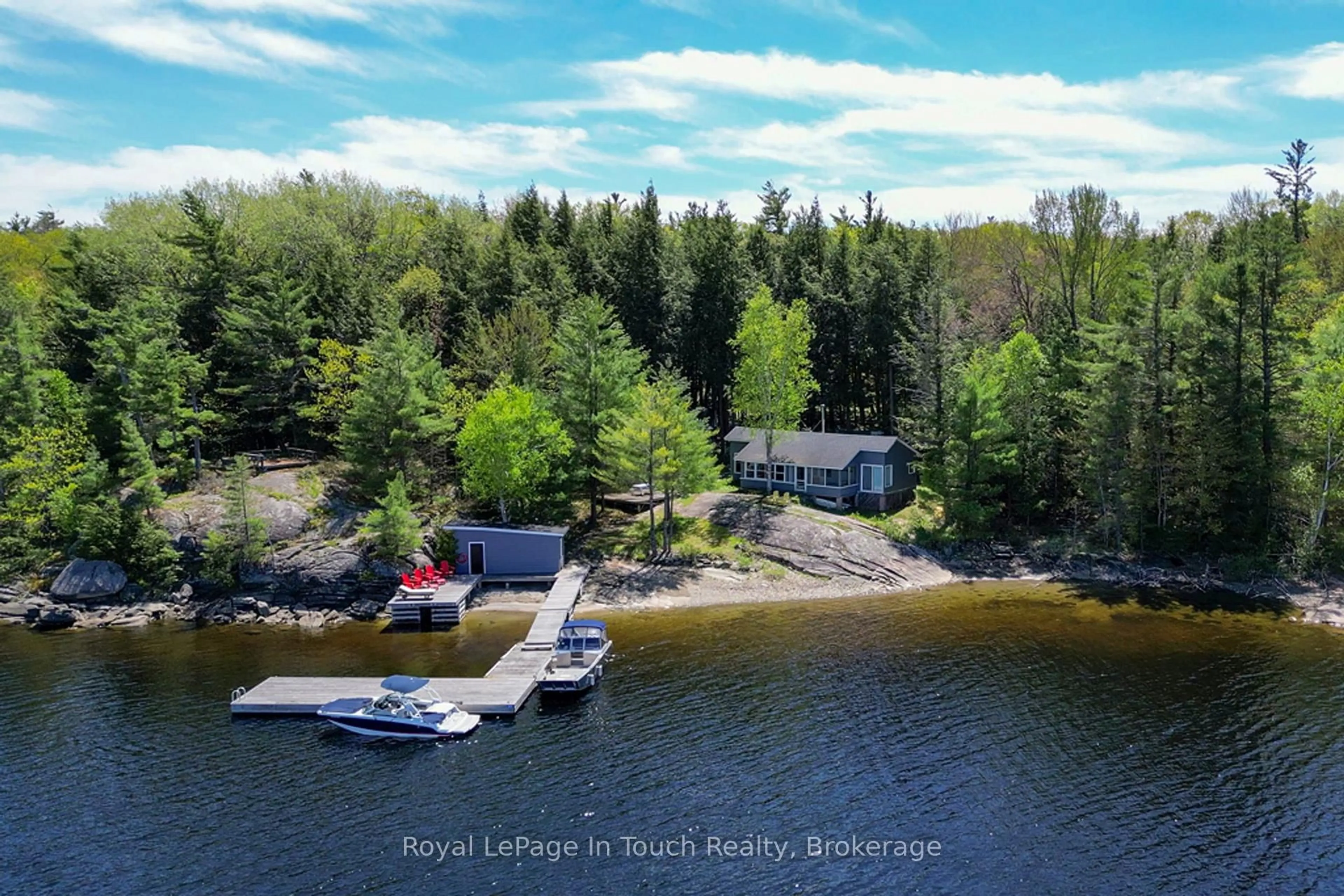 A pic from outside/outdoor area/front of a property/back of a property/a pic from drone, water/lake/river/ocean view for 15052 Georgian Bay Shore, Georgian Bay Ontario P0E 1E0
