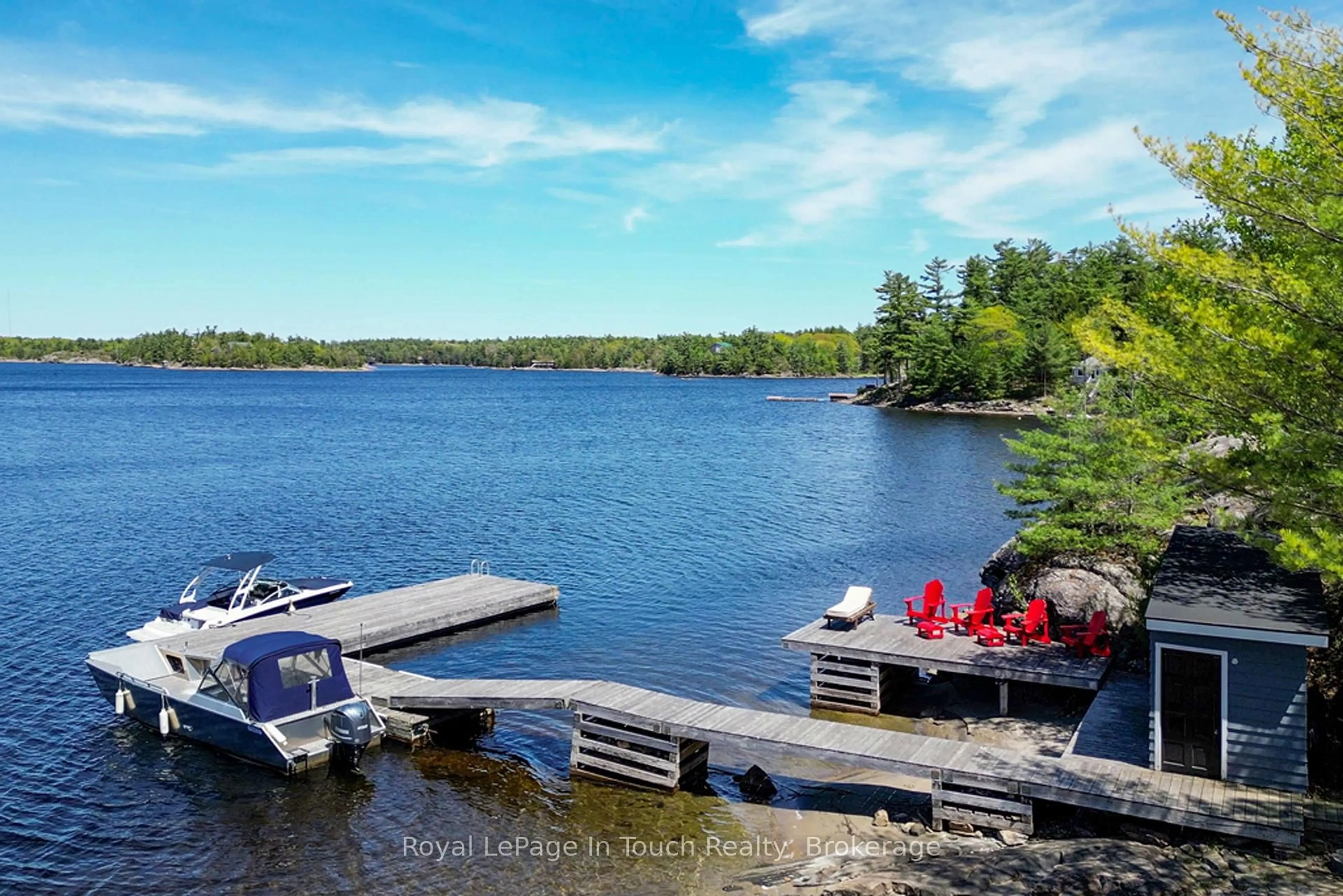 A pic from outside/outdoor area/front of a property/back of a property/a pic from drone, water/lake/river/ocean view for 15052 Georgian Bay Shore, Georgian Bay Ontario P0E 1E0