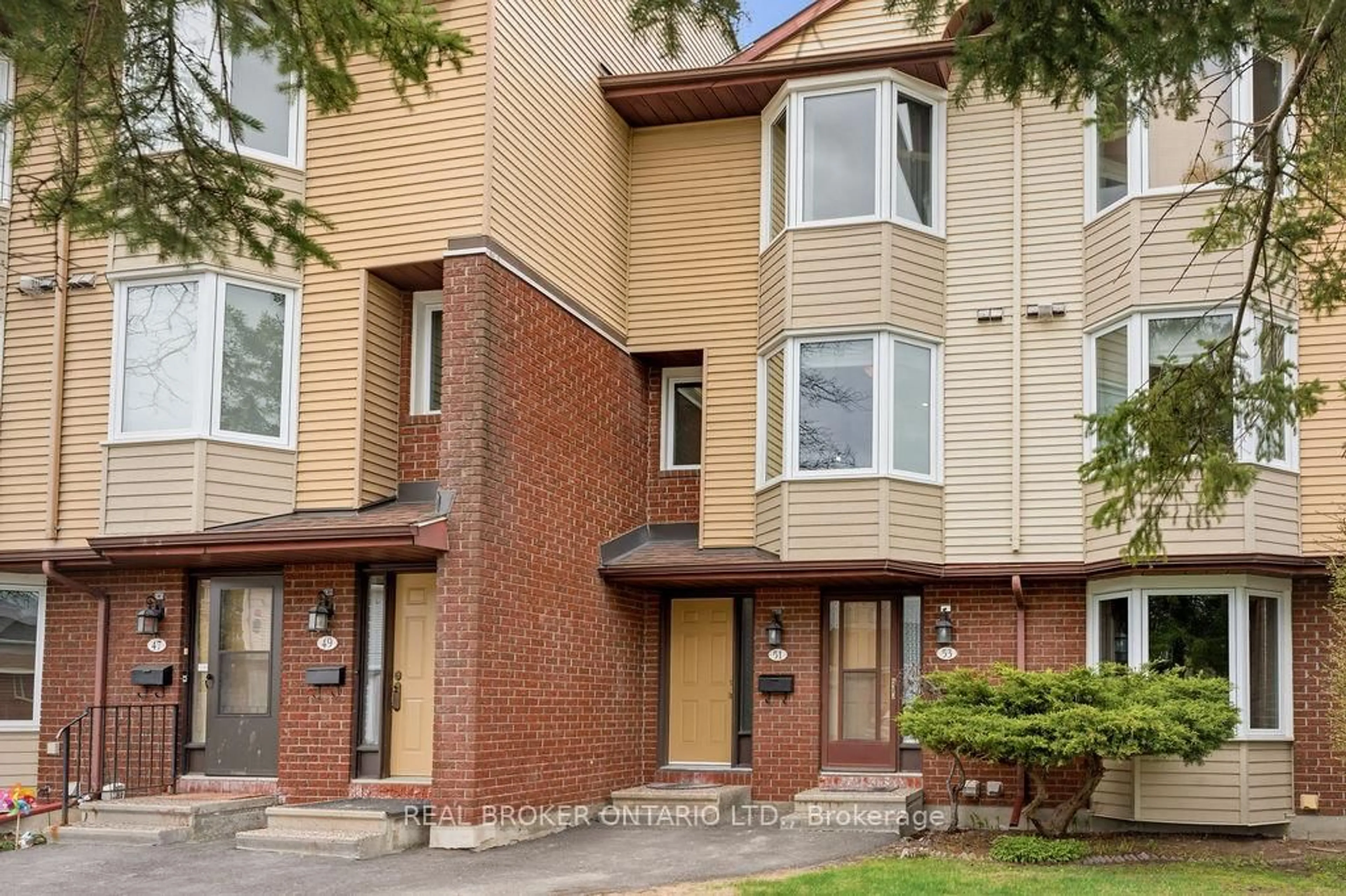 Home with brick exterior material, street for 51 Haxby Private, Ottawa Ontario K1T 3B7