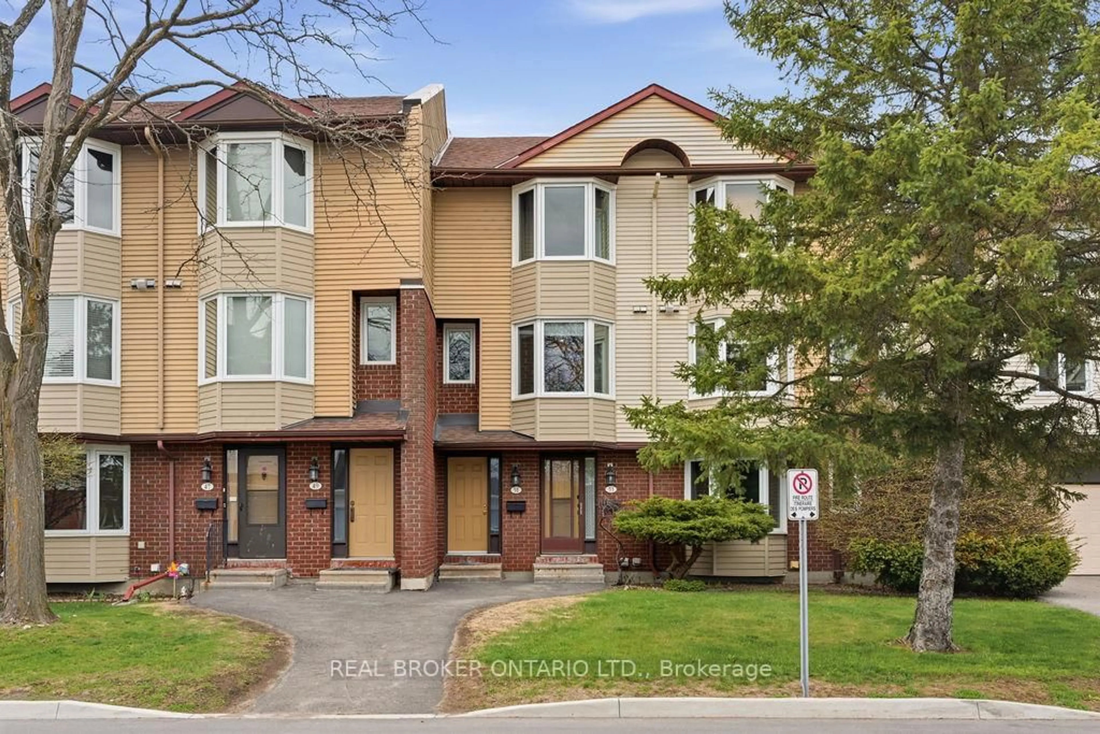 Home with brick exterior material, street for 51 Haxby Private, Ottawa Ontario K1T 3B7