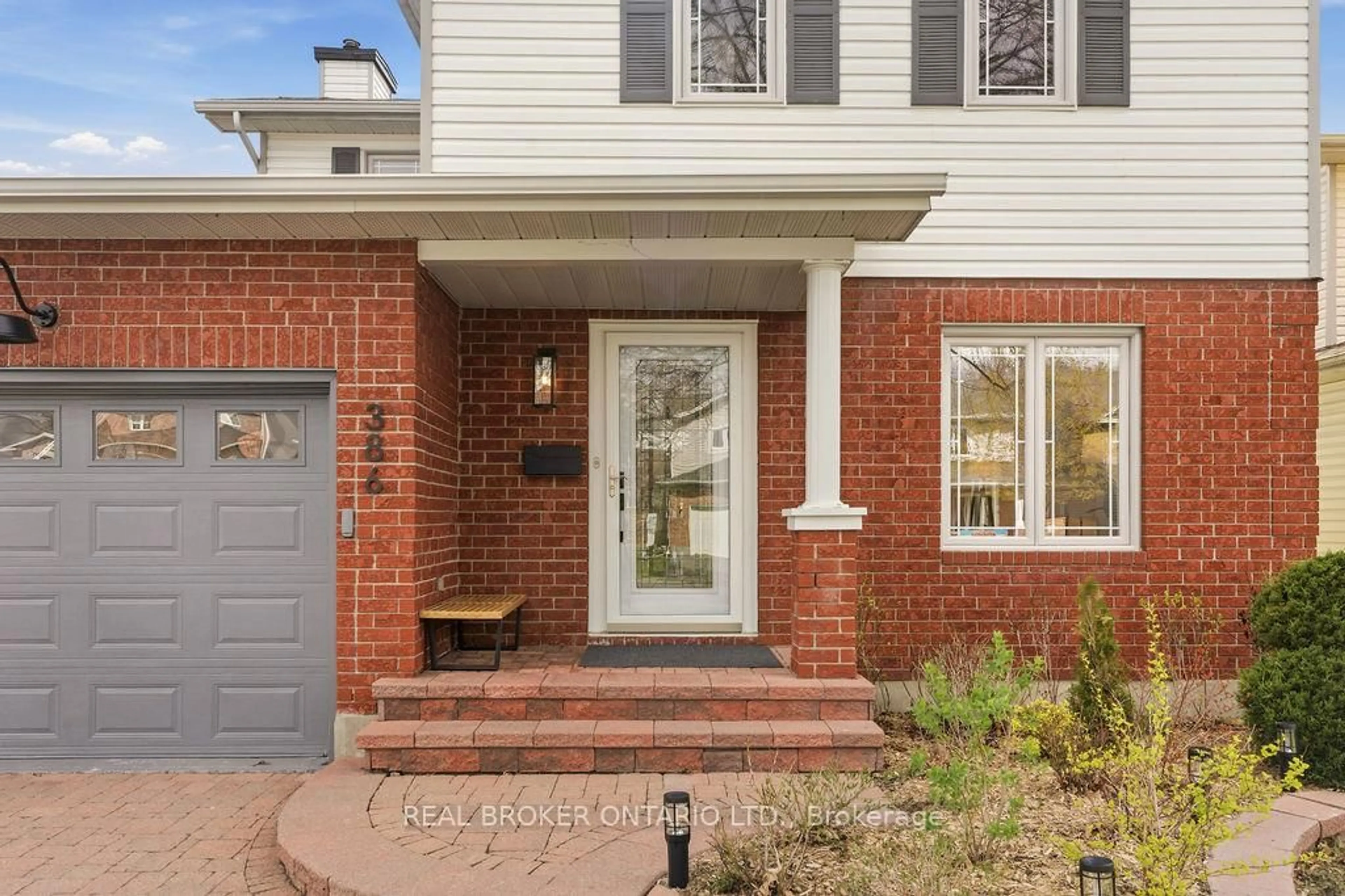 Home with brick exterior material, street for 386 Pauline Charron Pl, Ottawa Ontario K1L 8L3