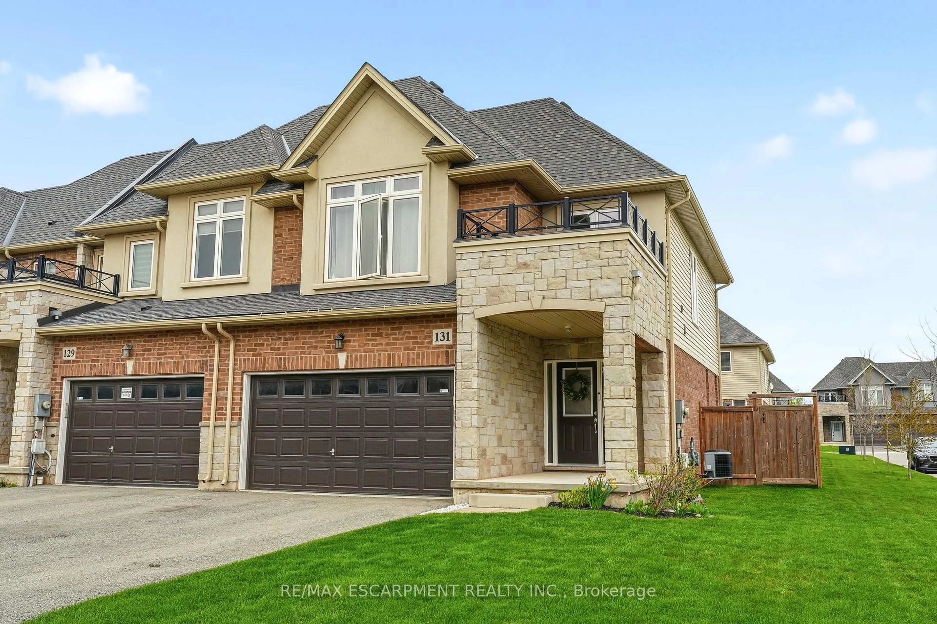 Home with brick exterior material, street for 131 Sonoma Lane, Hamilton Ontario L8E 0J9