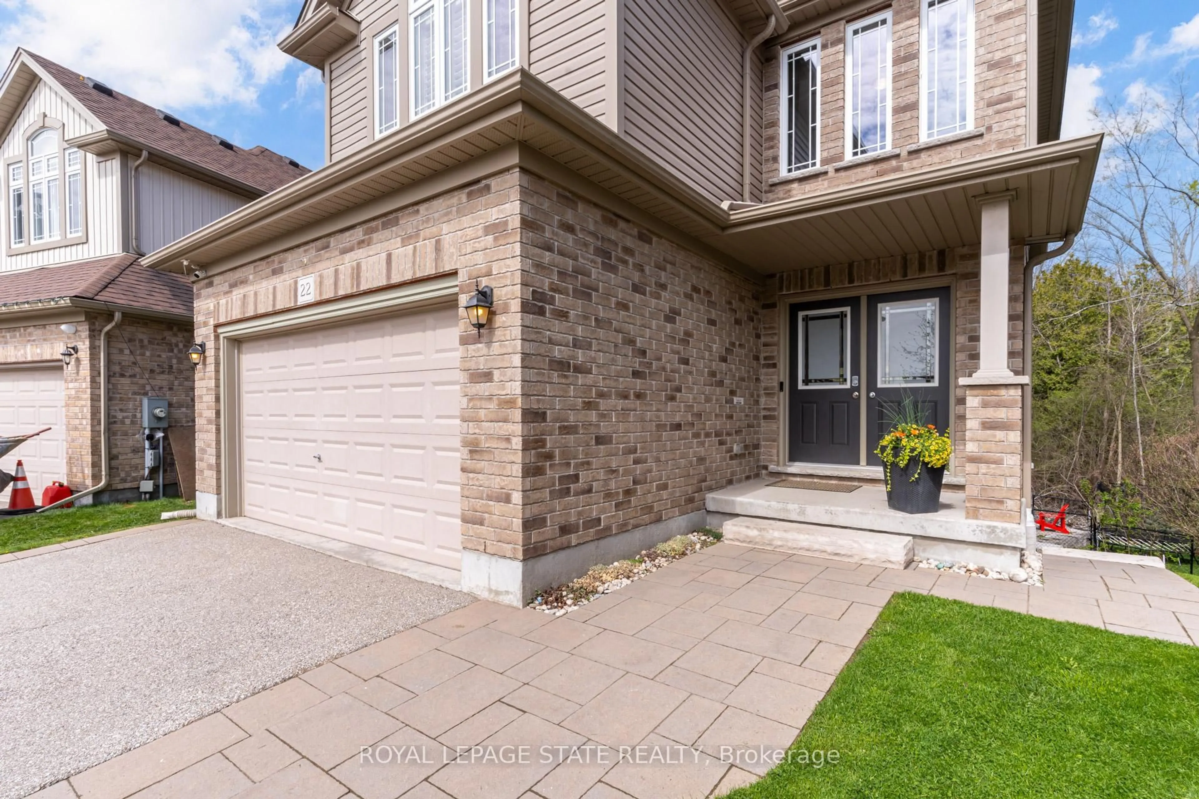Home with brick exterior material, street for 22 Rooke Crt, Guelph Ontario N1K 0B8