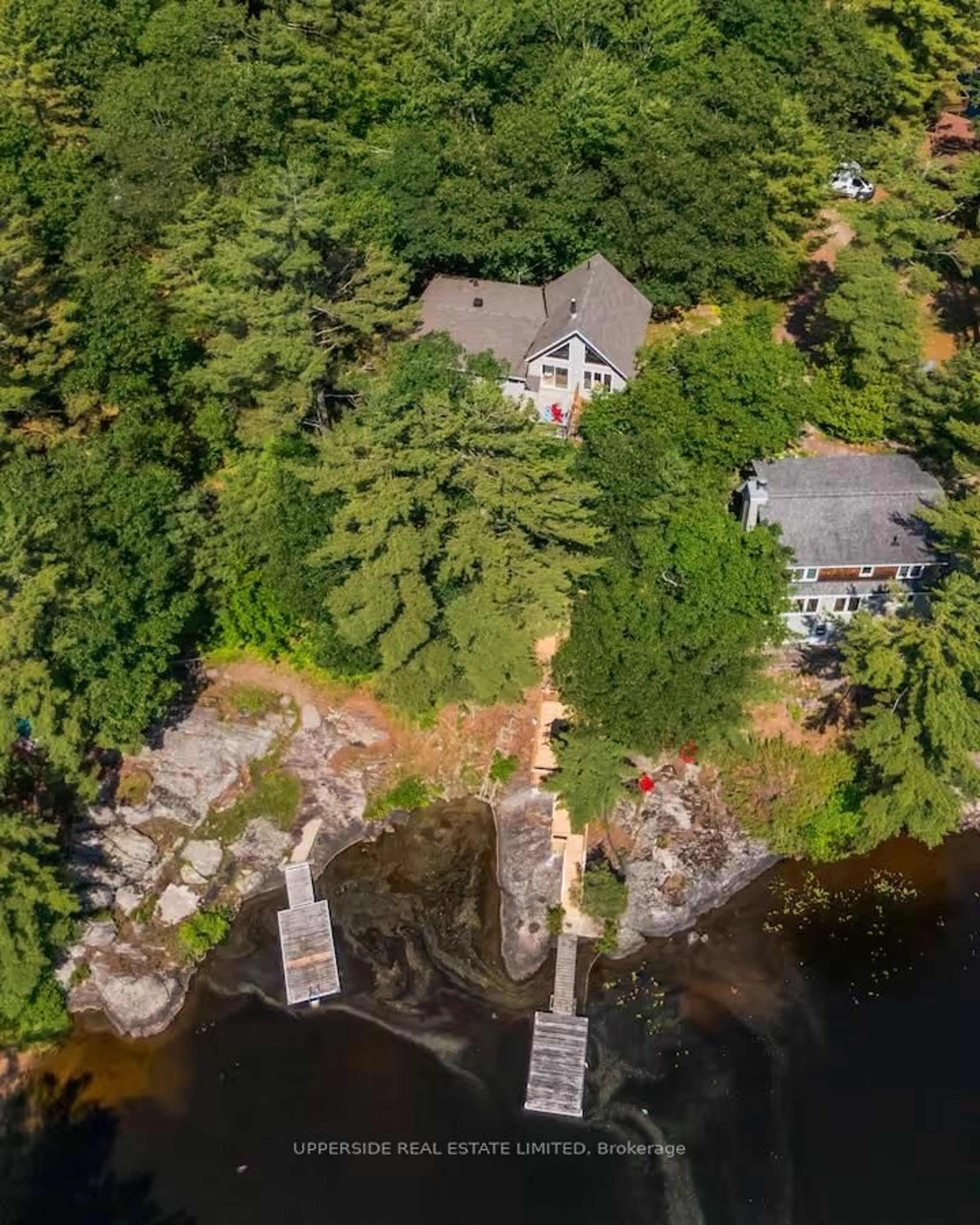 A pic from outside/outdoor area/front of a property/back of a property/a pic from drone, water/lake/river/ocean view for 1040 OAK Rd, Gravenhurst Ontario P0E 1G0