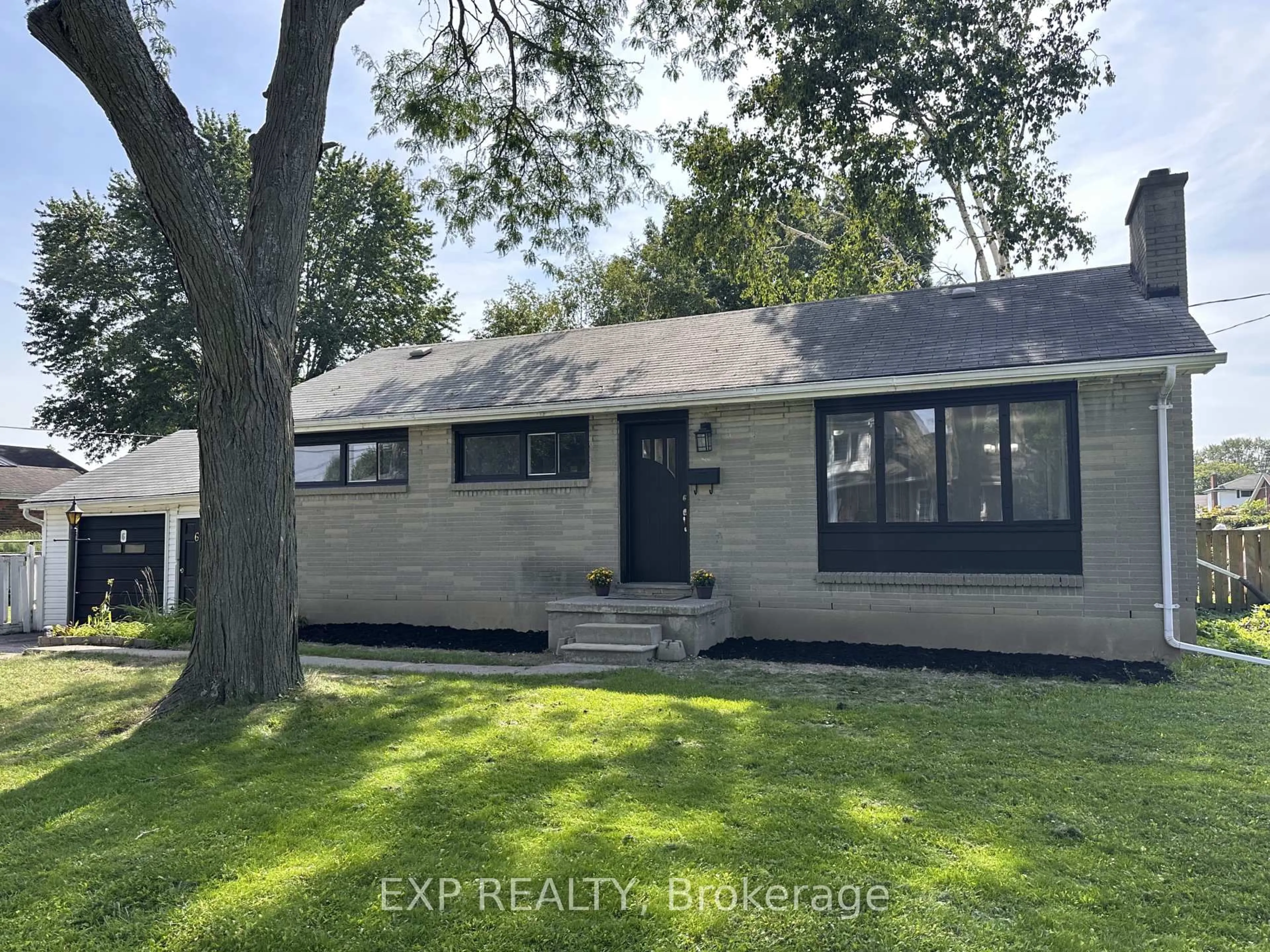 Home with brick exterior material, street for 6 Woodland Acre, Belleville Ontario K8N 4K1