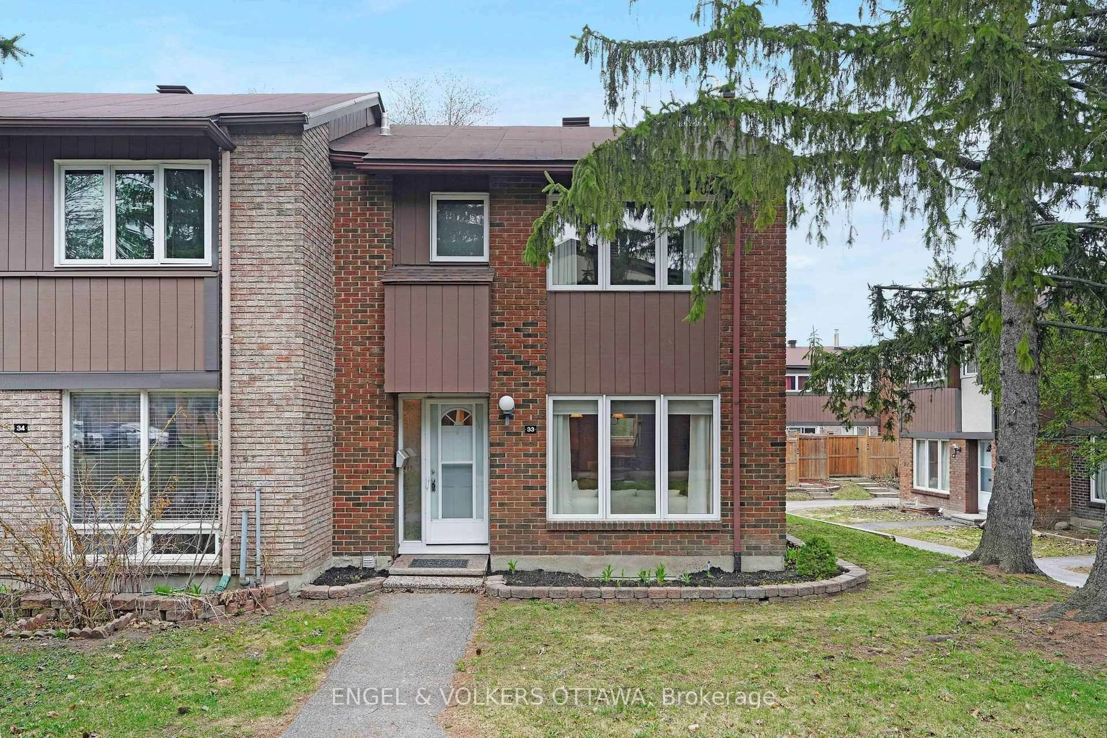 Home with brick exterior material, street for 2111 Montreal Rd #33, Ottawa Ontario K1J 8M8
