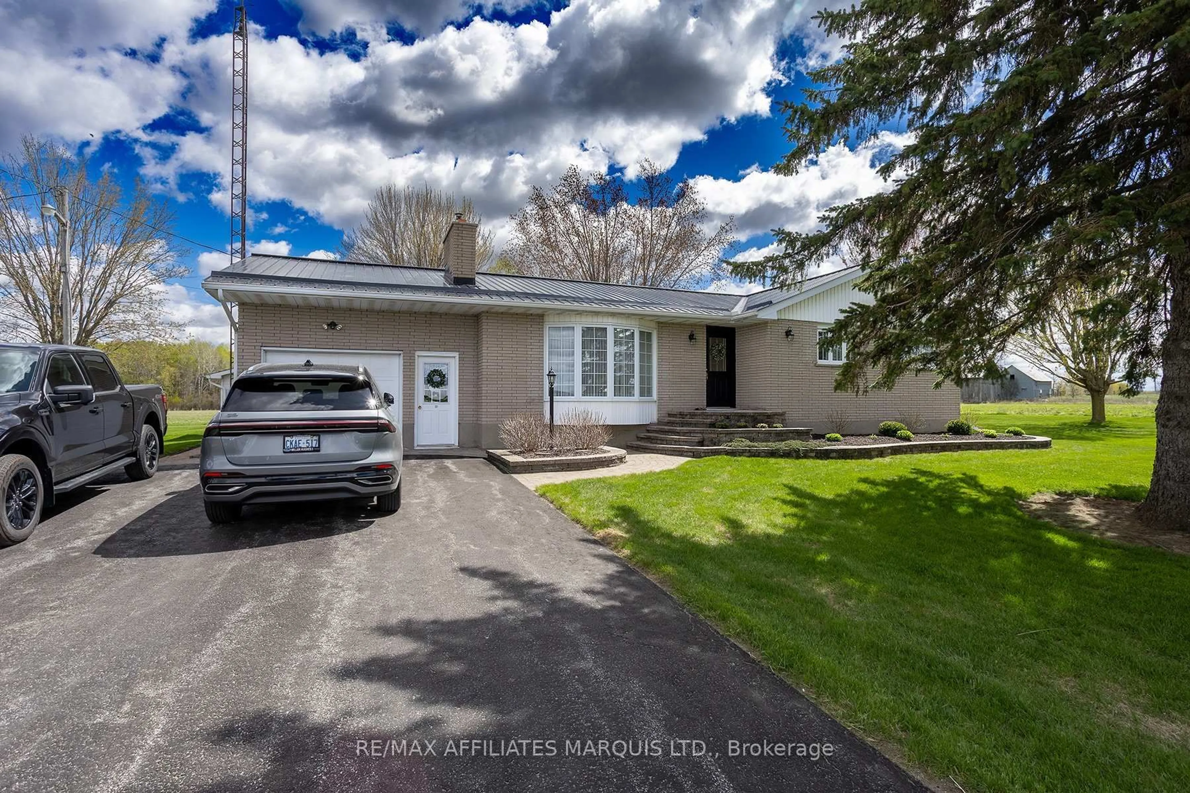 A pic from outside/outdoor area/front of a property/back of a property/a pic from drone, street for 4263 Boucks Hill Rd, South Dundas Ontario K0C 2H0