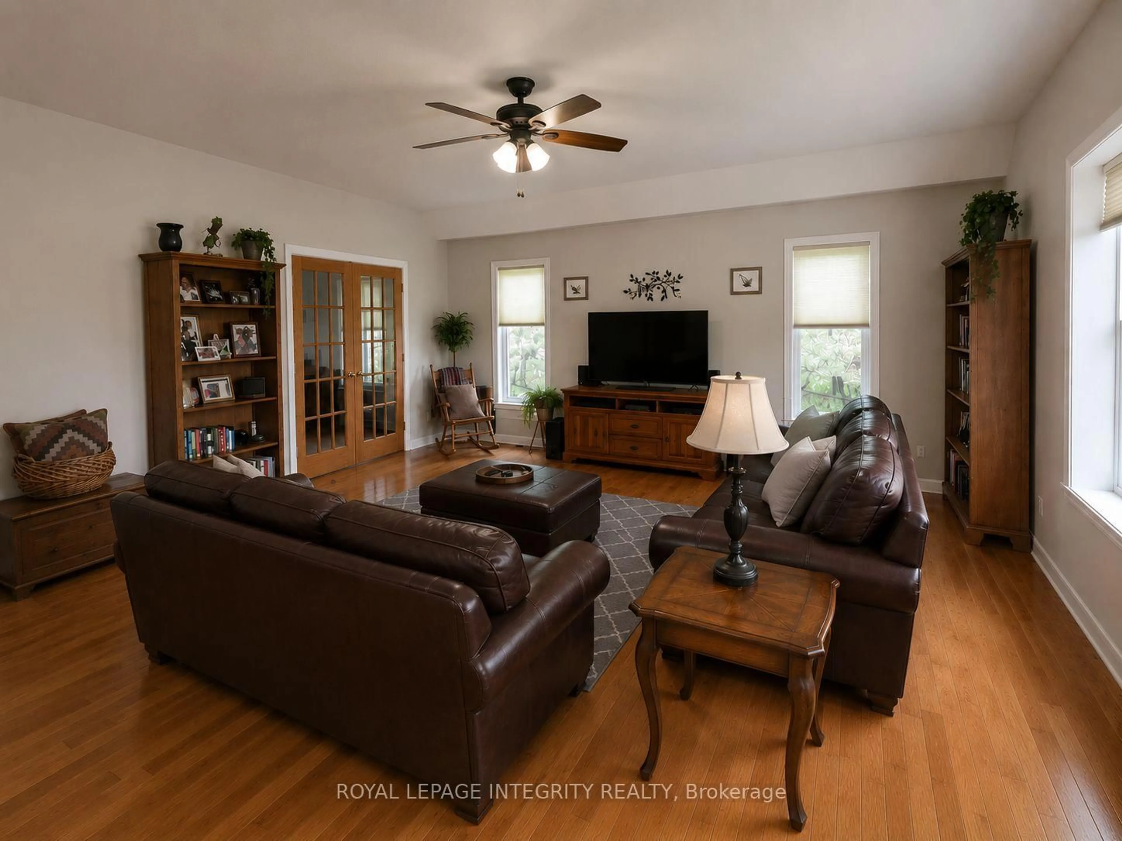 Living room with furniture, wood/laminate floor for 21170 Concession 9 Rd, South Glengarry Ontario K0C 1Z0