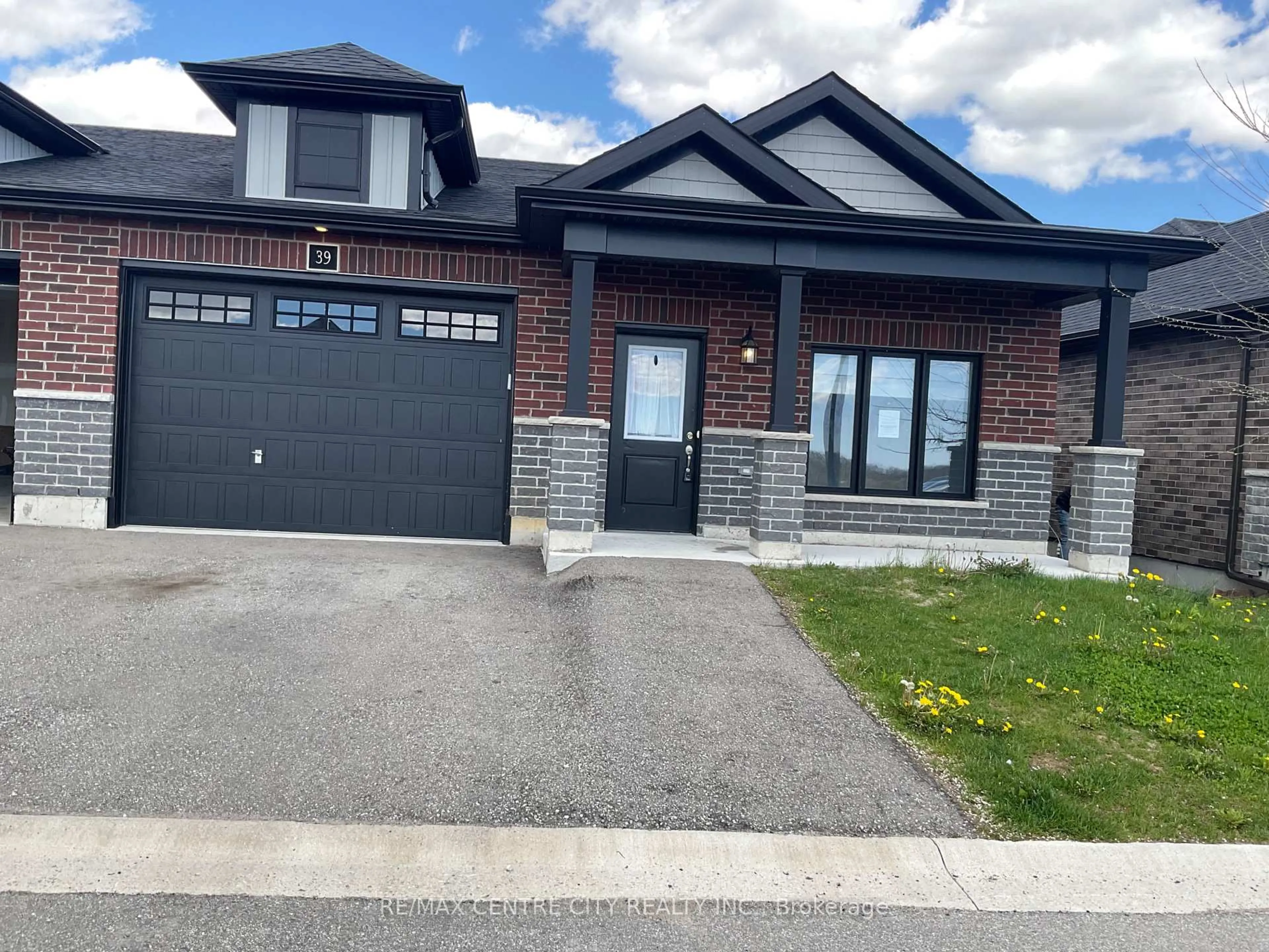 Home with brick exterior material, street for 39 WATERTHRUSH Lane, Norfolk Ontario N3Y 0E9