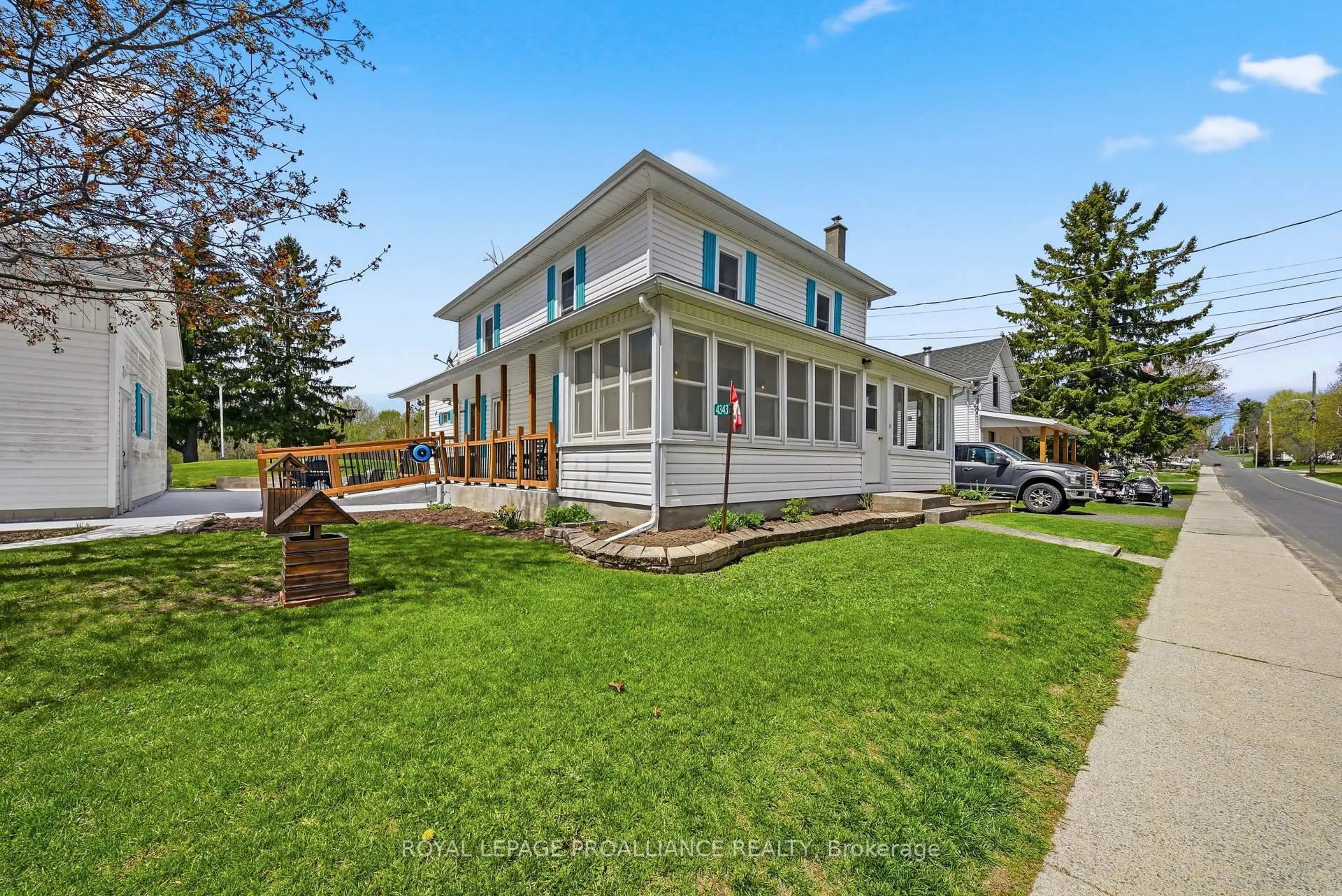 Home with vinyl exterior material, street for 4343 Notre Dame St, Harrowsmith Ontario K0H 1V0