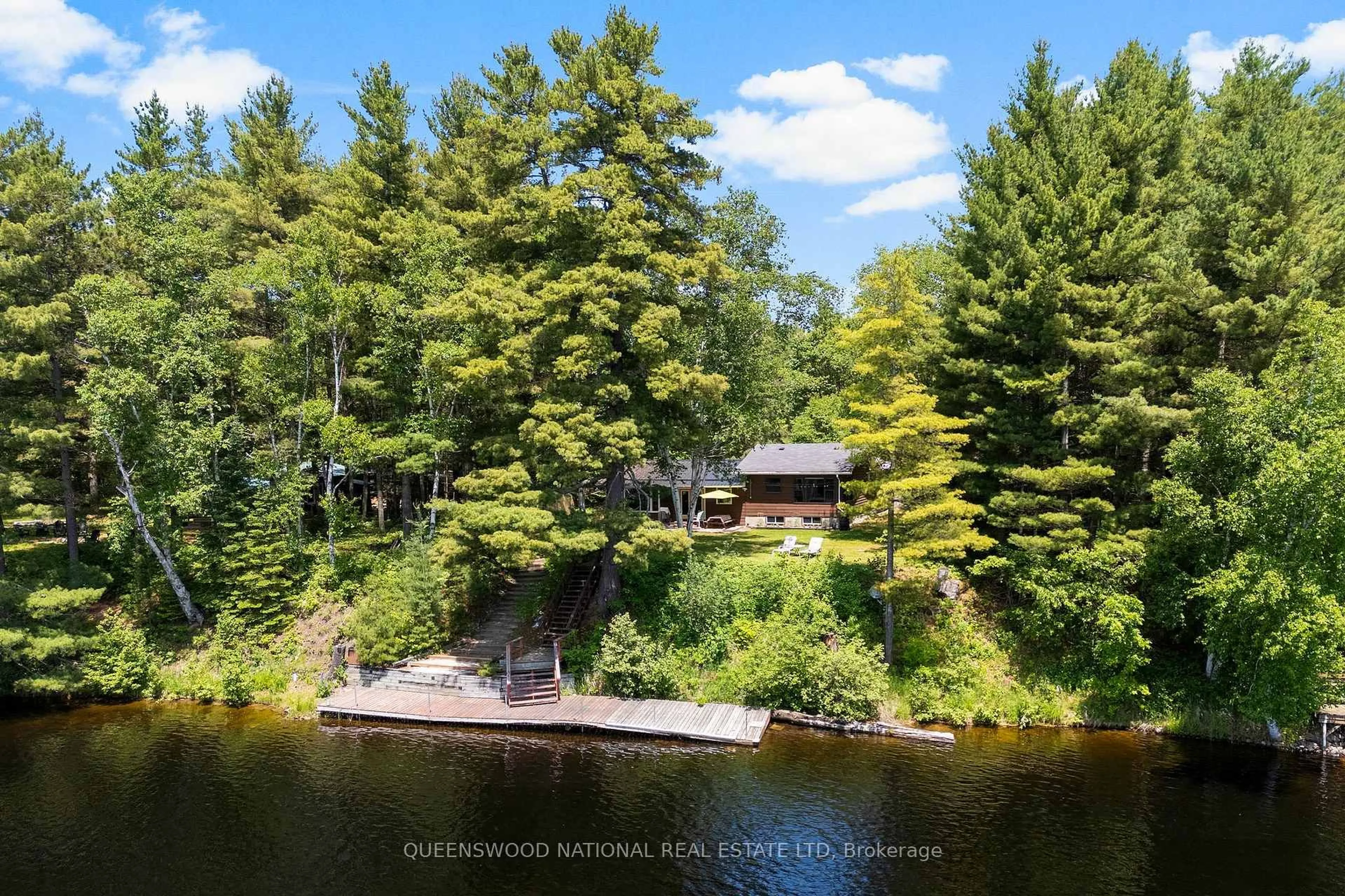 A pic from outside/outdoor area/front of a property/back of a property/a pic from drone, water/lake/river/ocean view for 618 River Rd, Barry's Bay Ontario K0J 1B0