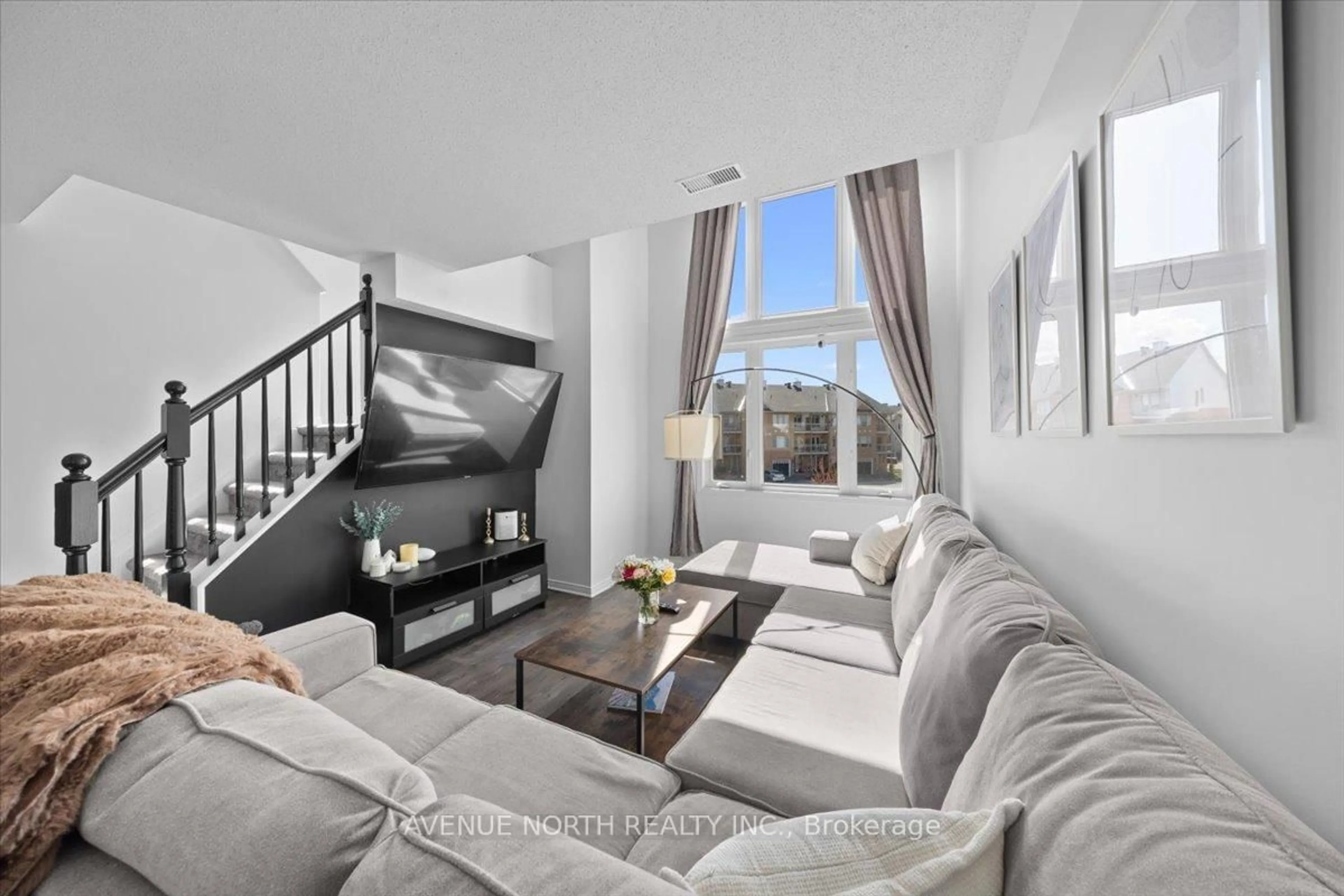 Living room with furniture, unknown for 220 Tivoli Private #25, Ottawa Ontario K2E 0A7