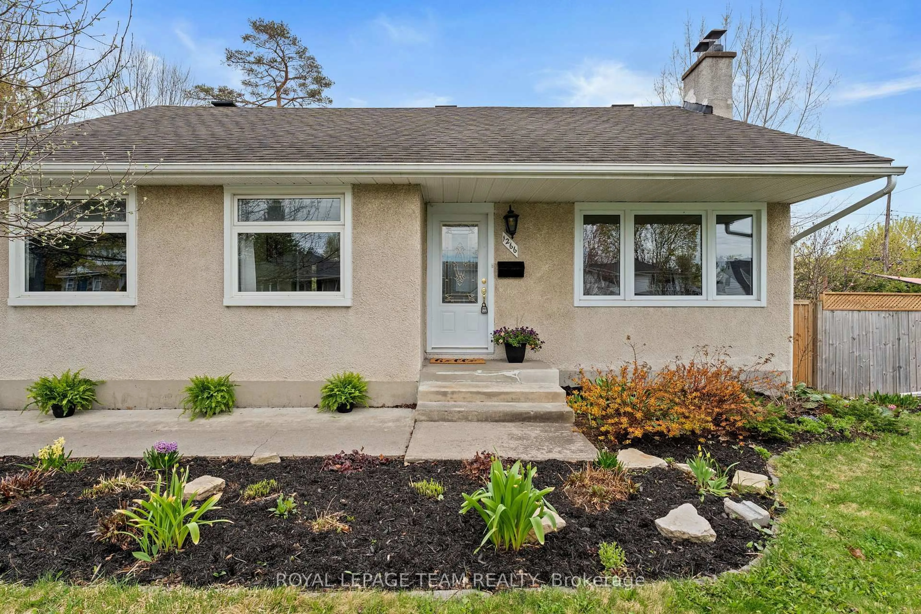 Home with vinyl exterior material, street for 1266 Randall Ave, Ottawa Ontario K1H 7R1