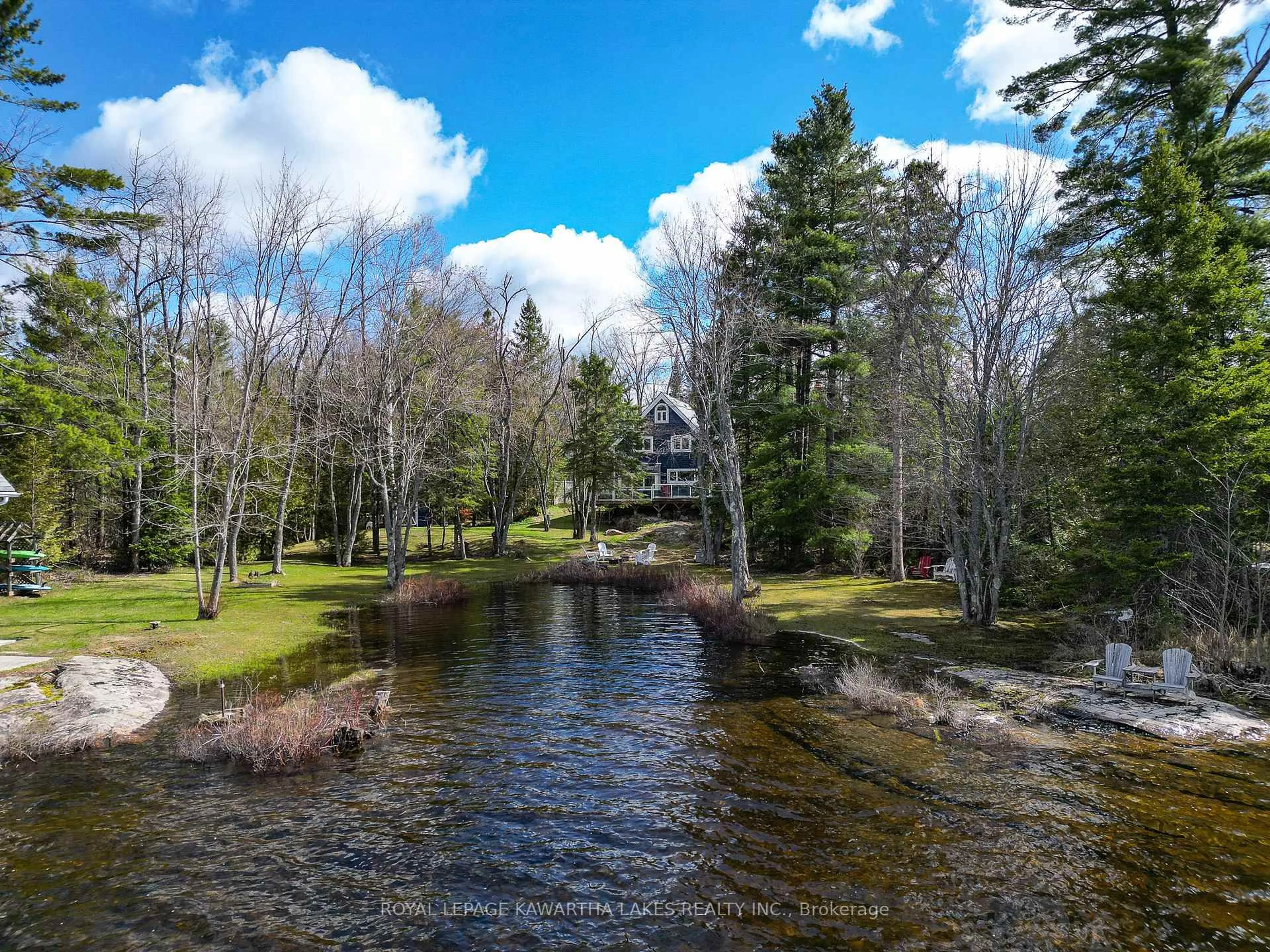 A pic from outside/outdoor area/front of a property/back of a property/a pic from drone, water/lake/river/ocean view for 11 Woodworth Dr, Kawartha Lakes Ontario K0M 1C0