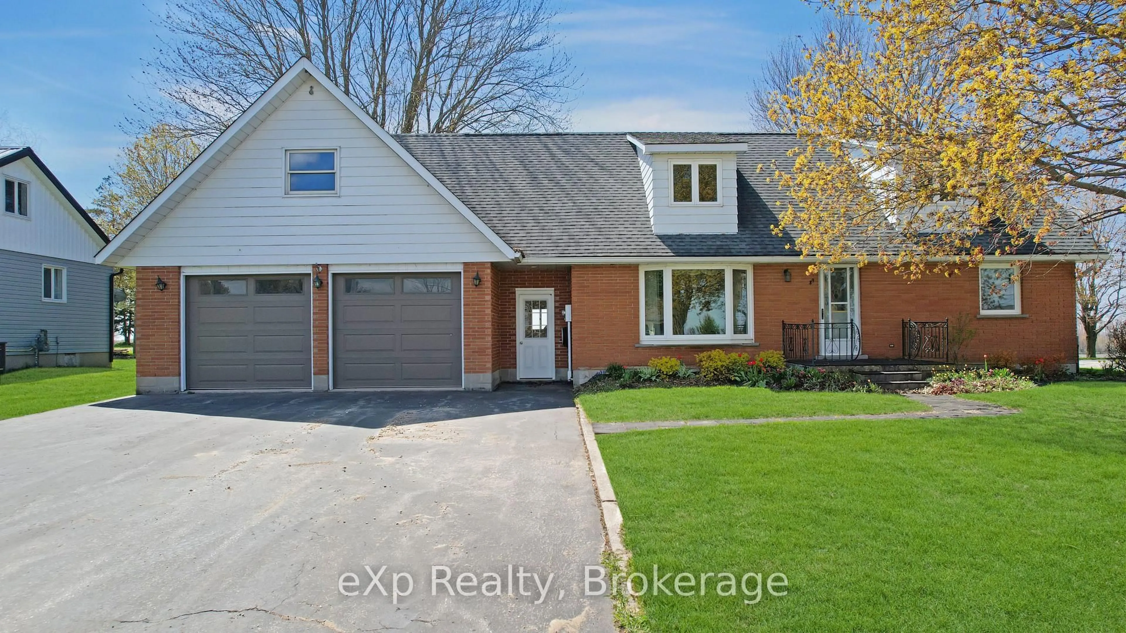 Home with brick exterior material, street for 1267 Bruce Road 12, South Bruce Ontario N0G 1W0